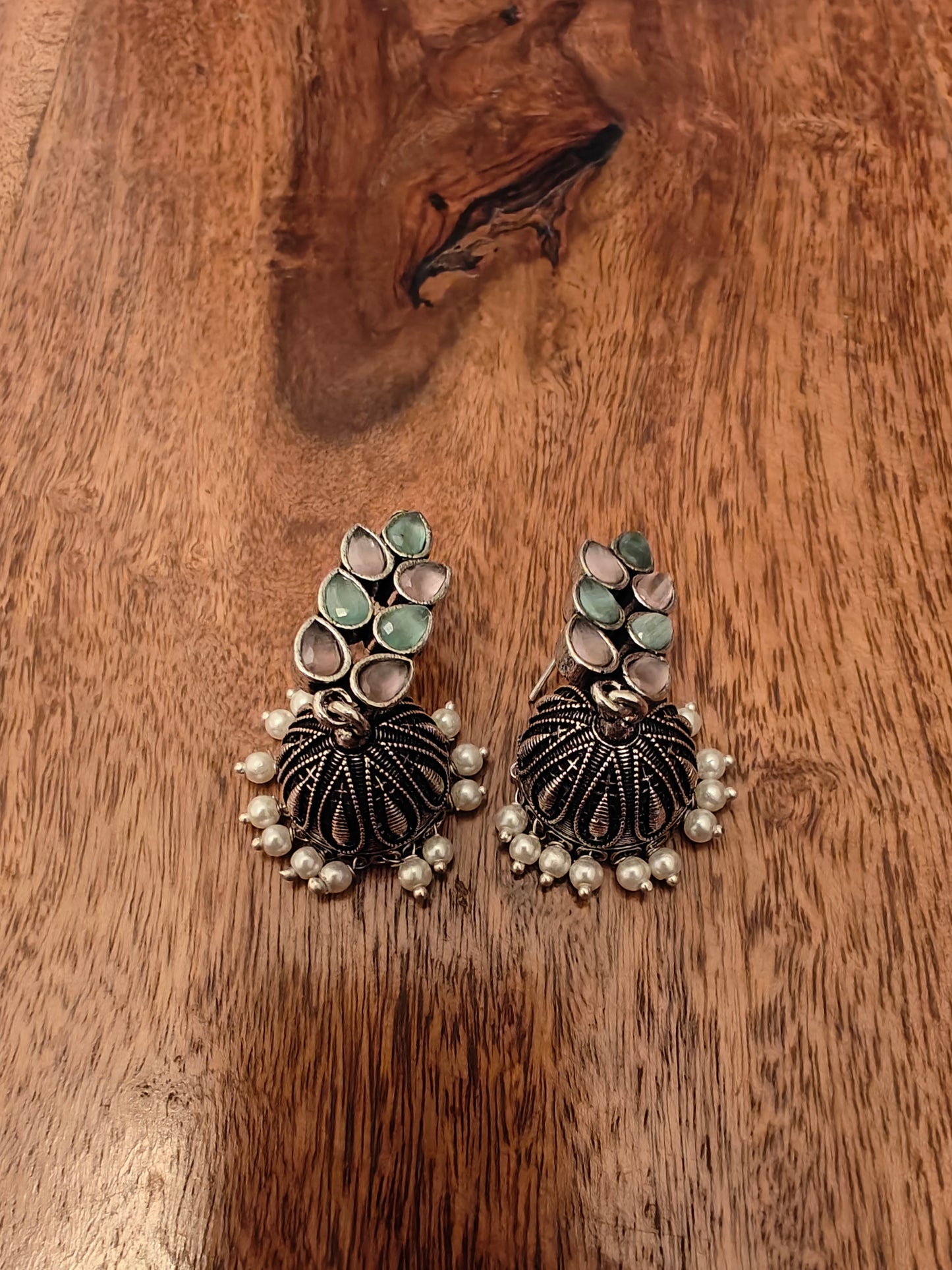 Jhumkis(earrings)with stones and pearl hangings