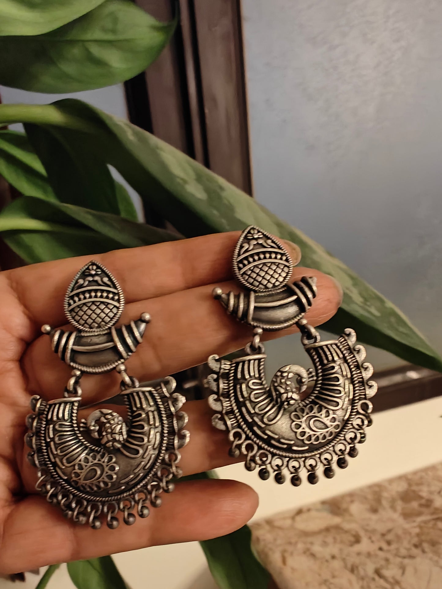 Kalash earrings with peacock