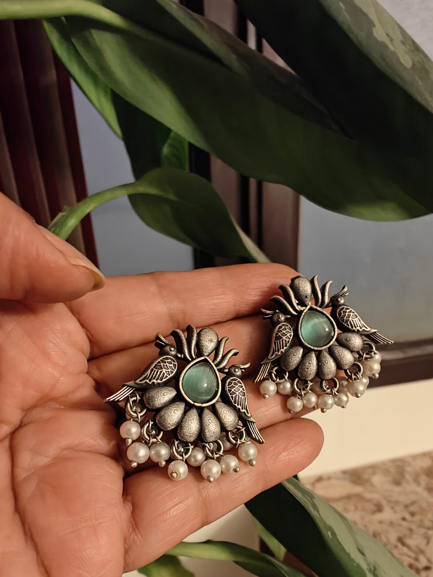 Studs(earrings)with mint green/ pint stone