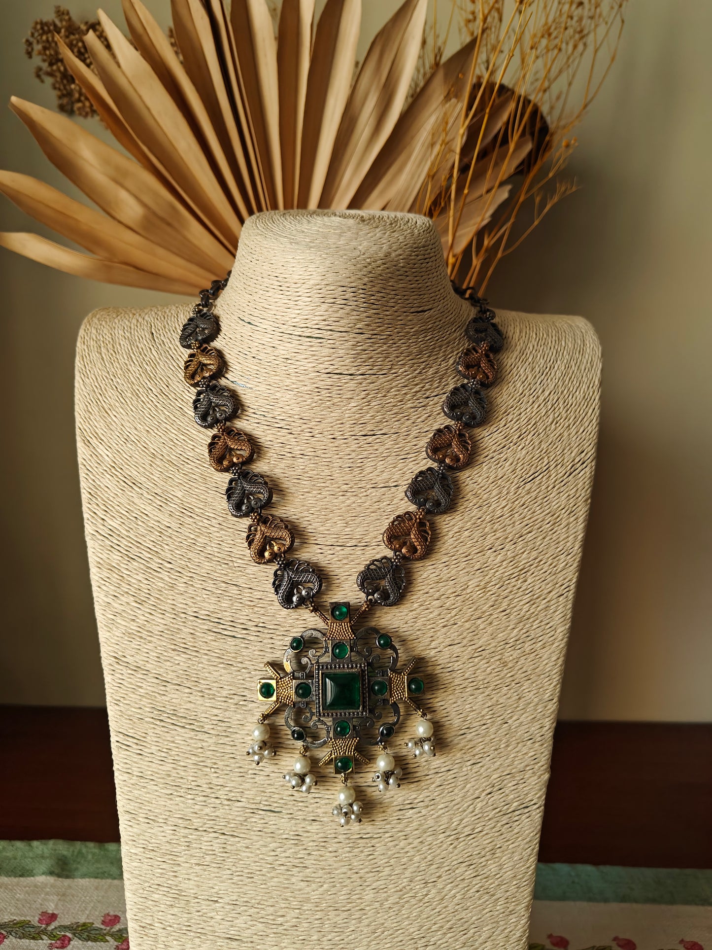 Dual tone necklace in antique finish with peacocks and big stone pendant