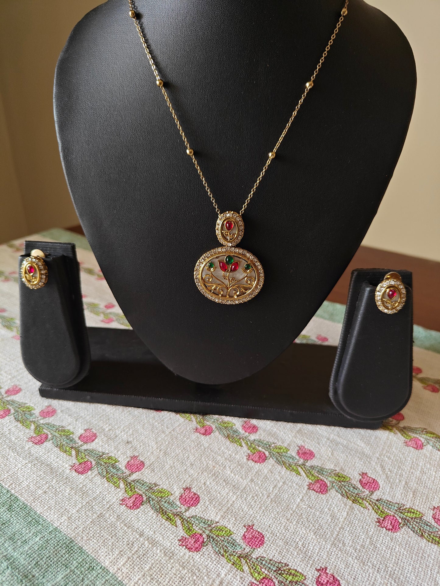 Mythily set with mother of pearl and stone work