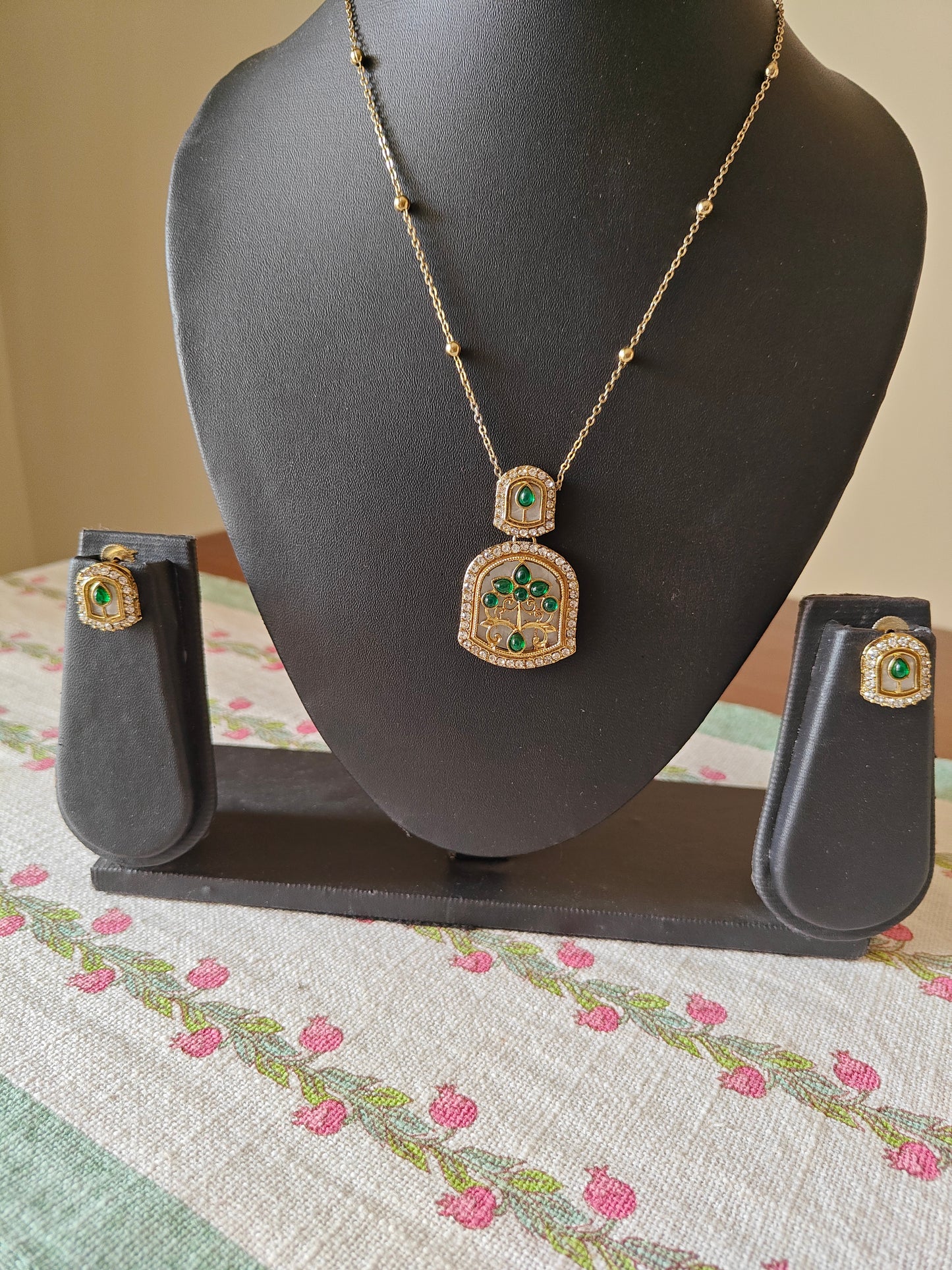 Mythily set with mother of pearl and stone work