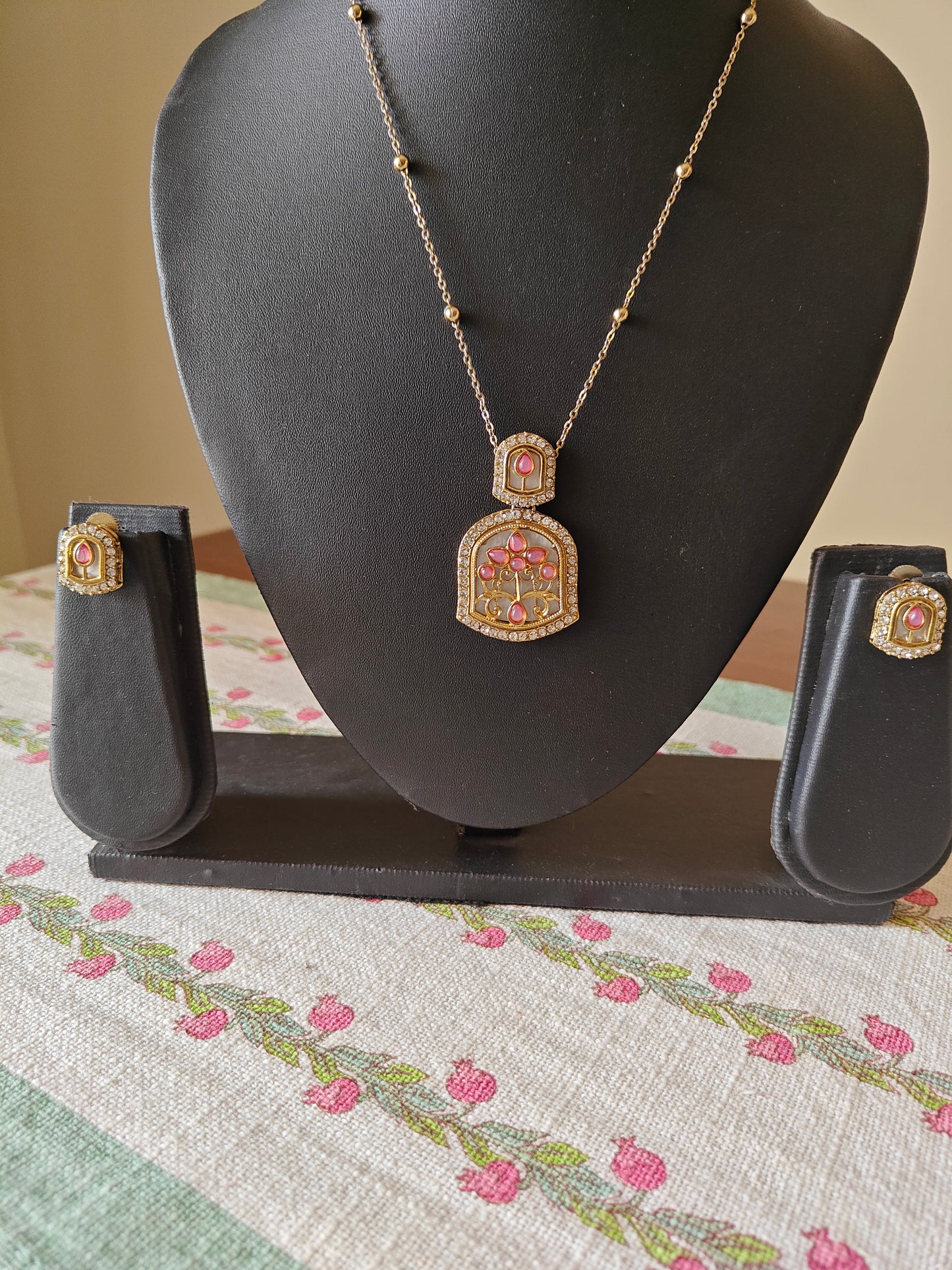 Mythily set with mother of pearl and stone work