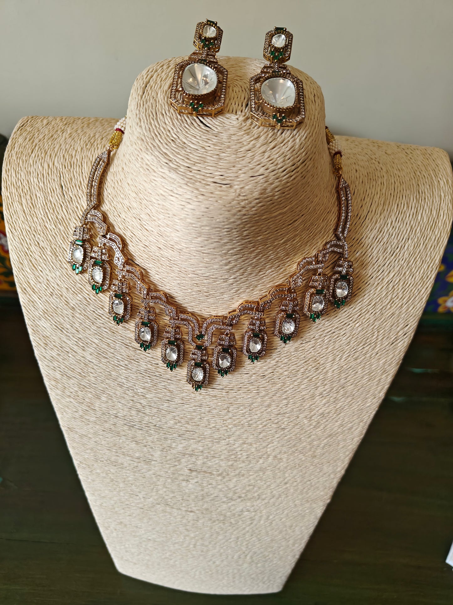 Geena set with moissanite and emerald green stone