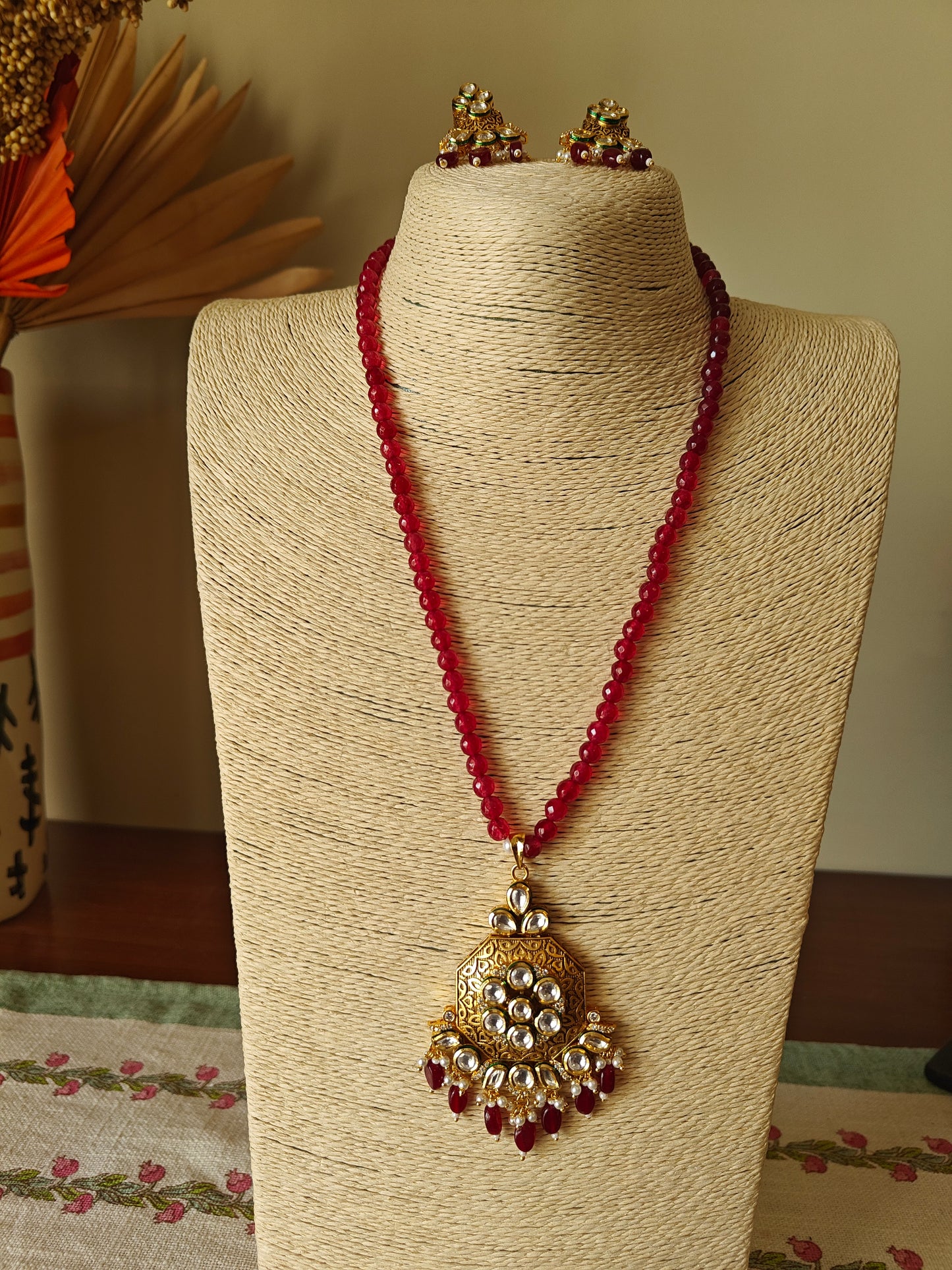 Abhati set with kundan piece with meenakari on stone string
