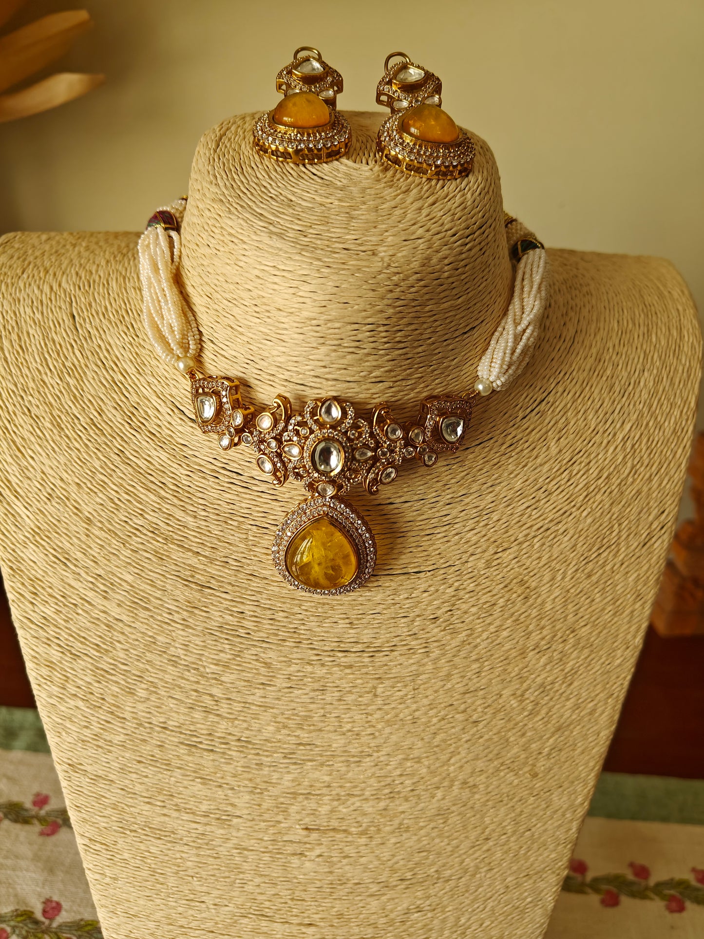 Nirupa choker set with stone and moissanite on poth pearl strings