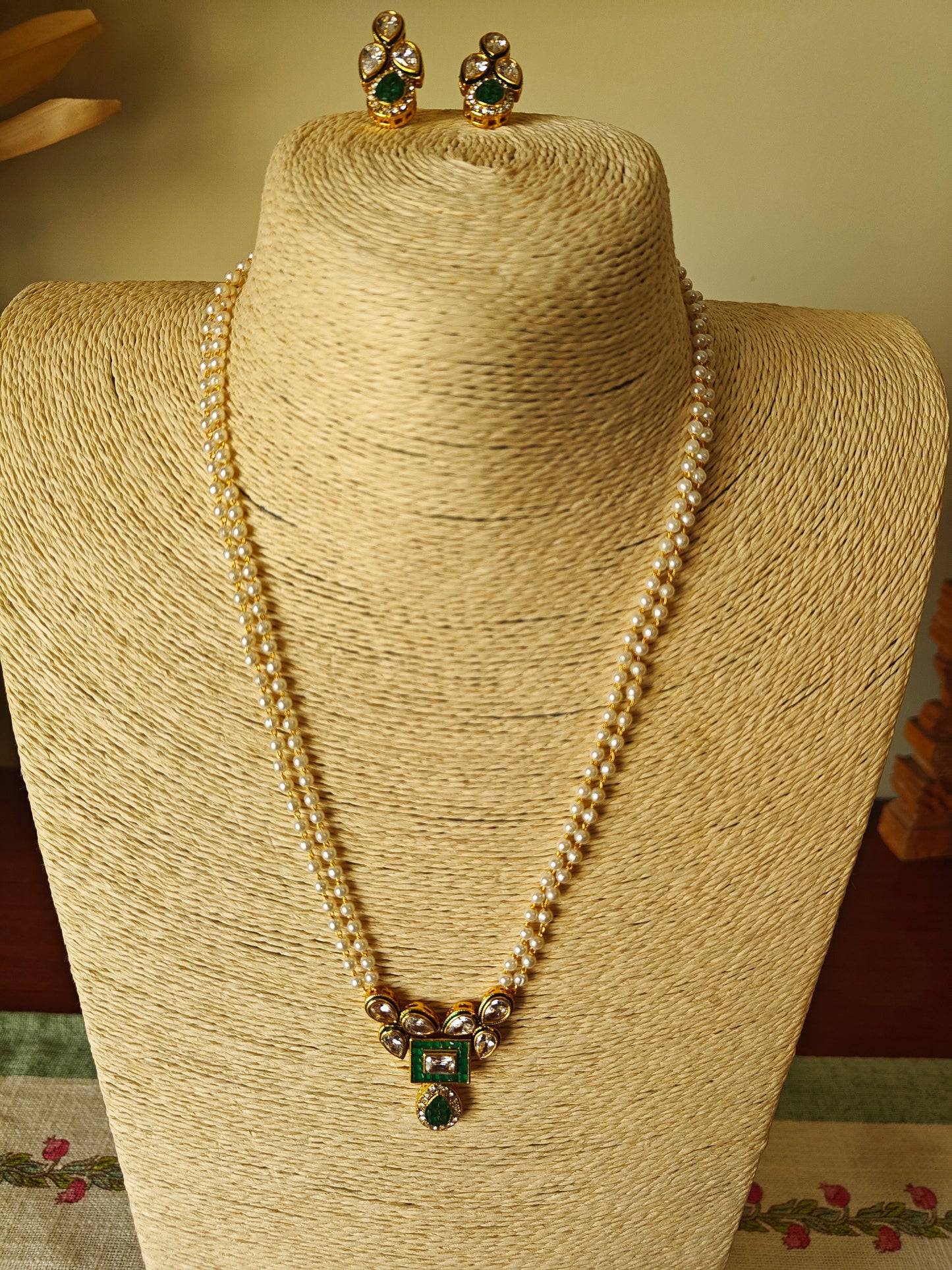 Madhumati set with kundan and stone on pearl strings