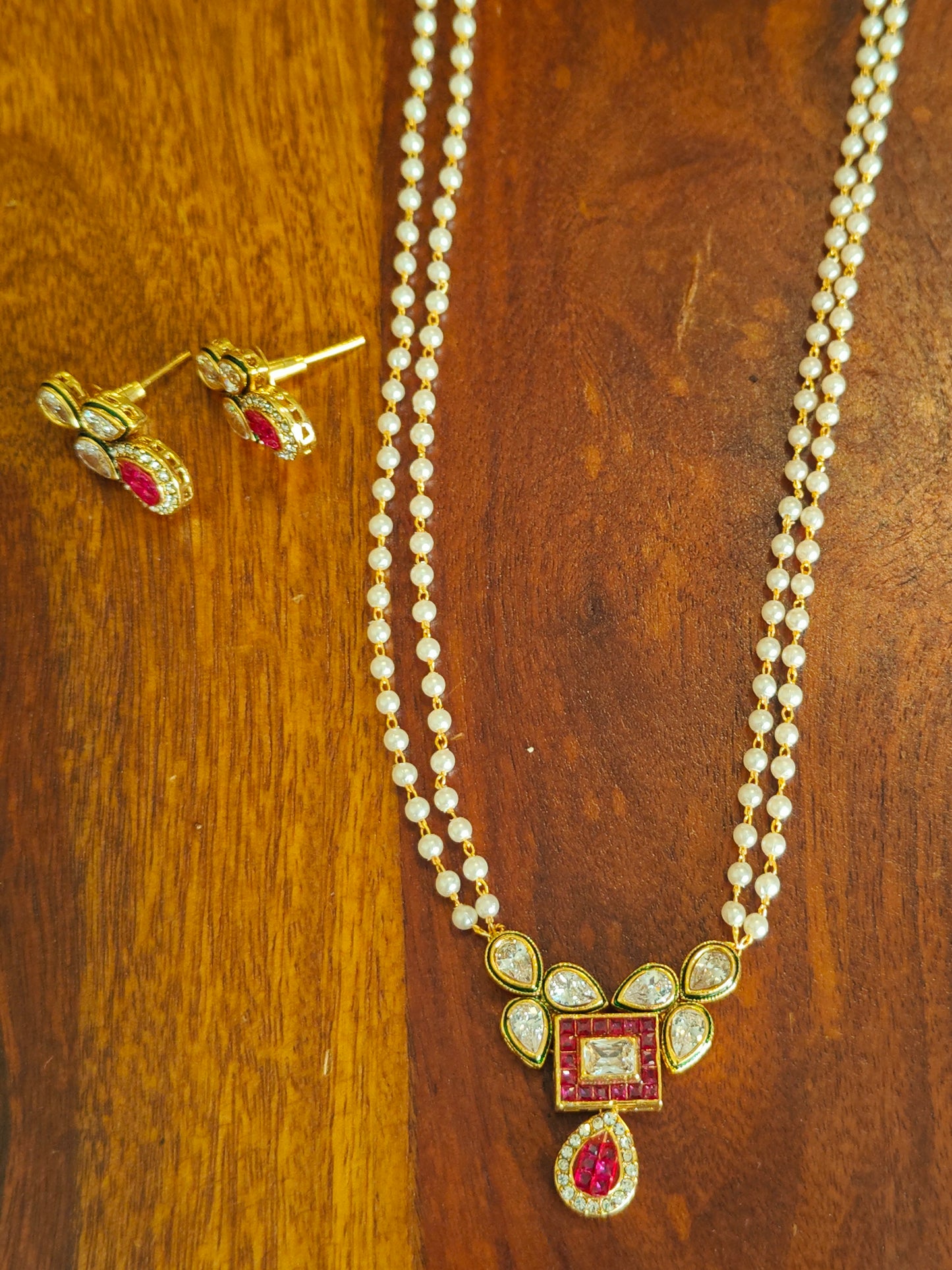 Madhumati set with kundan and stone on pearl strings