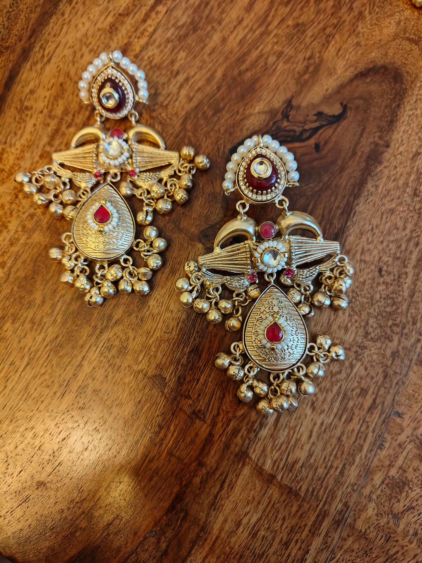 Nirmitha dual tone set with red stones