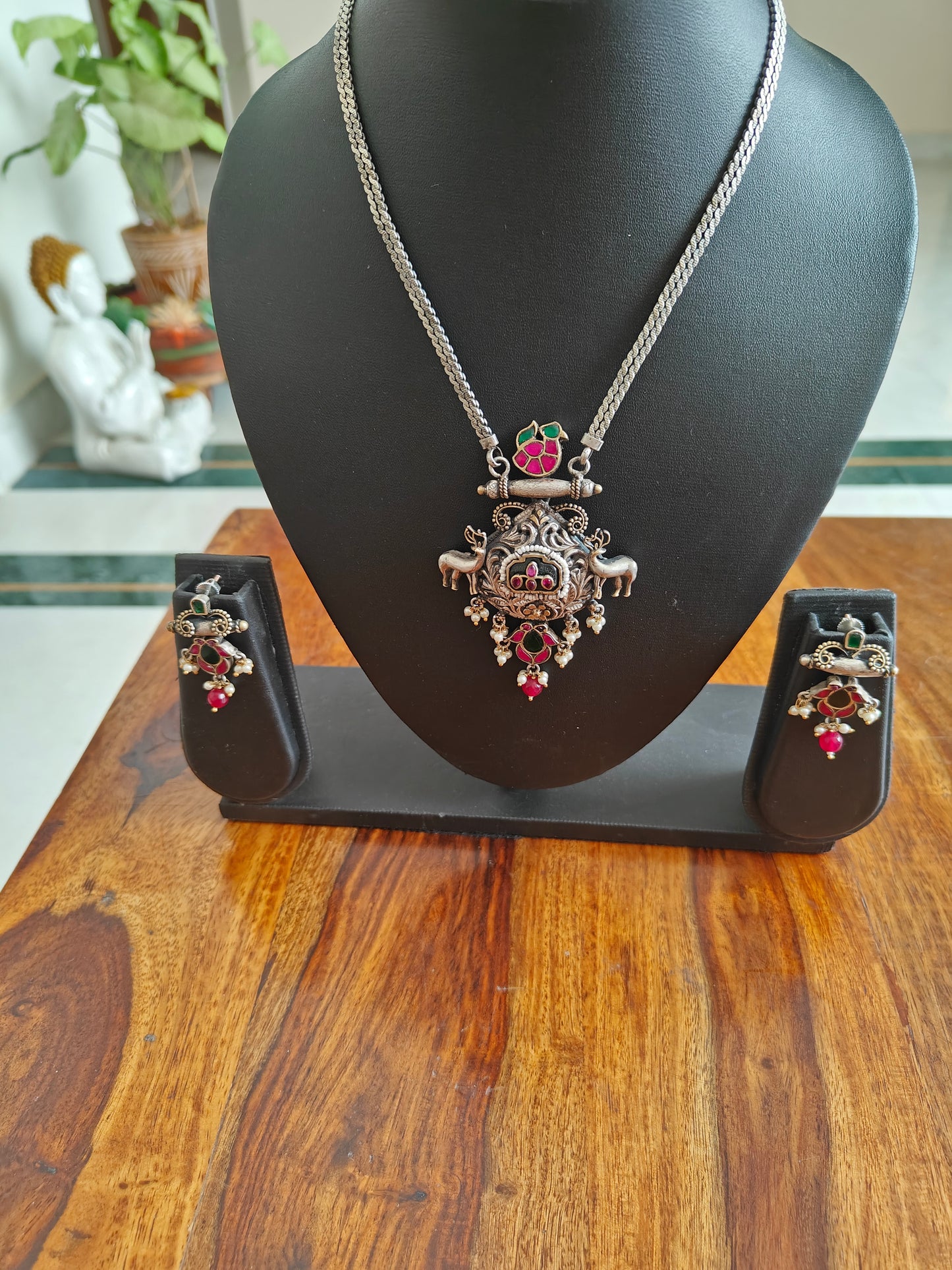 Kuyil set in dual tone with deers and kemp stones