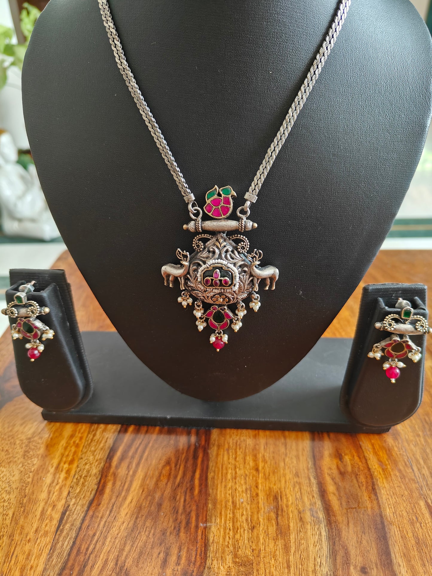 Kuyil set in dual tone with deers and kemp stones