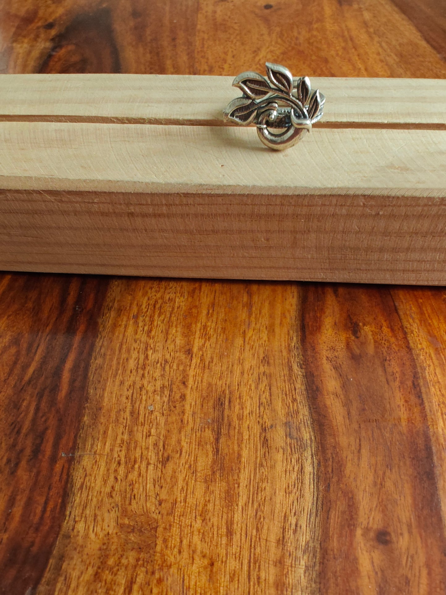 Sterling silver ring with perched peacock