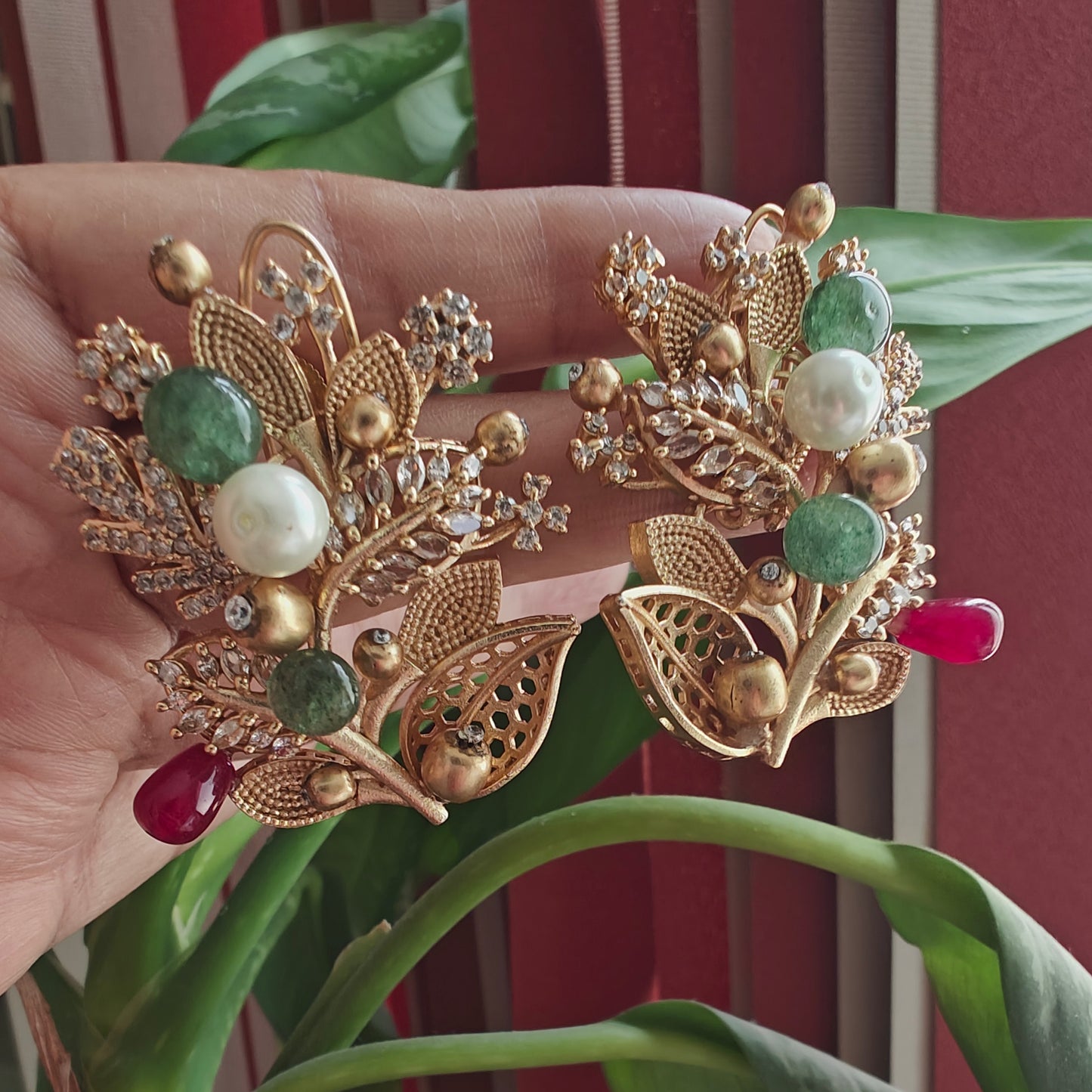 Elaborate twig and stone flower earrings