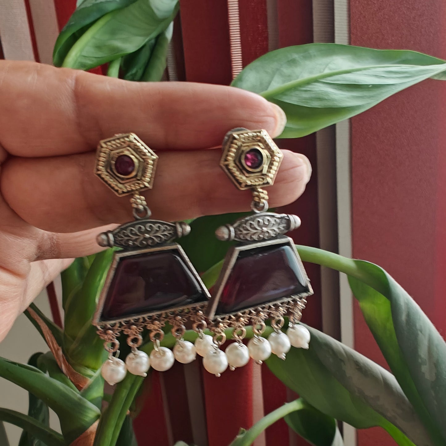 Dual tone earrings with coloured stone