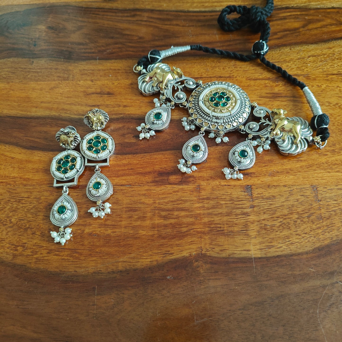 Dual tone choker set with cow motif,stones and pearls