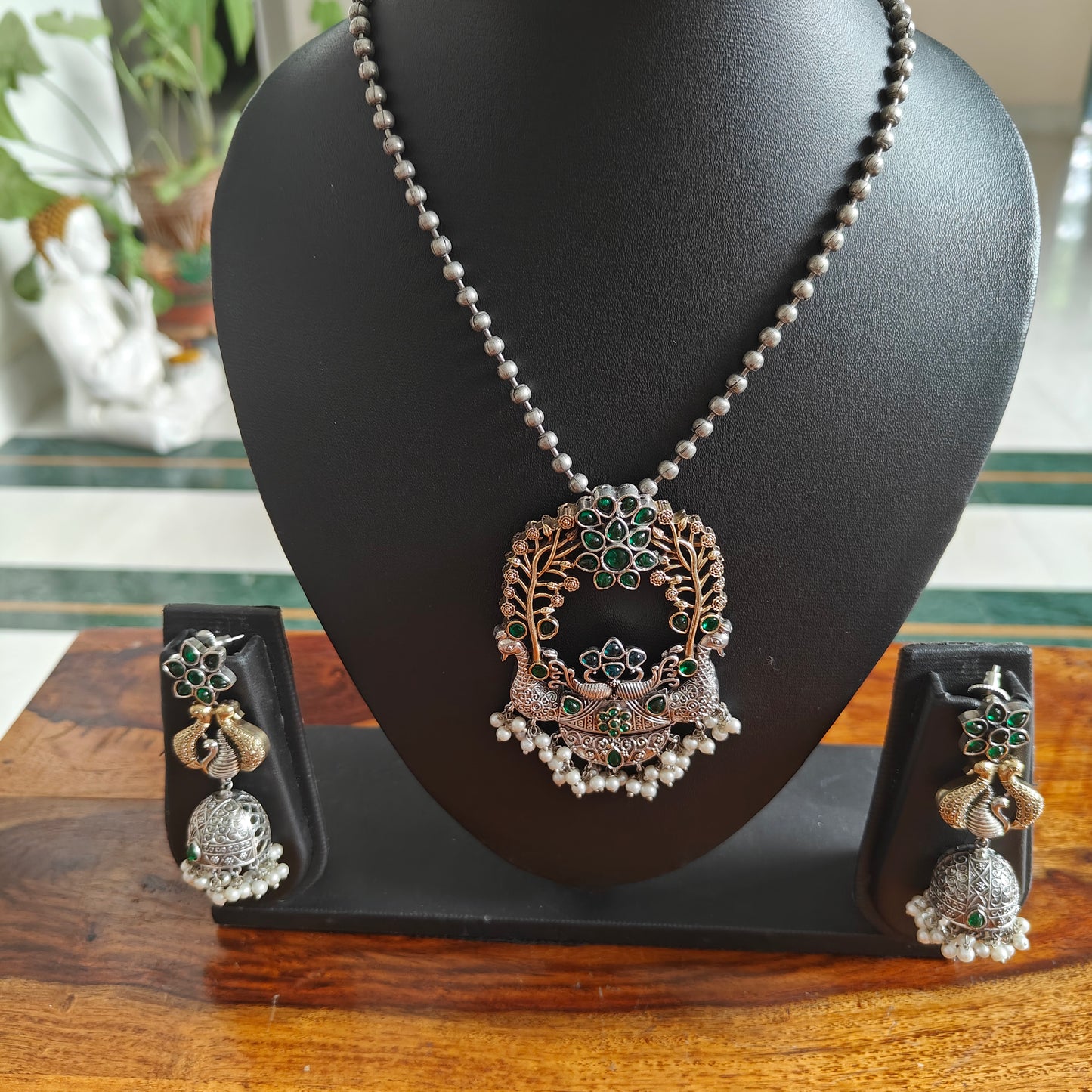 Dual tone two peacock pendant set on bead chain
