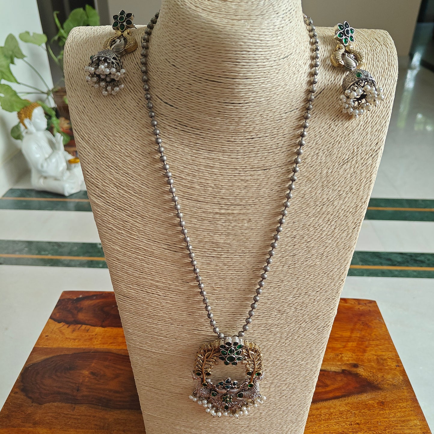 Dual tone two peacock pendant set on bead chain