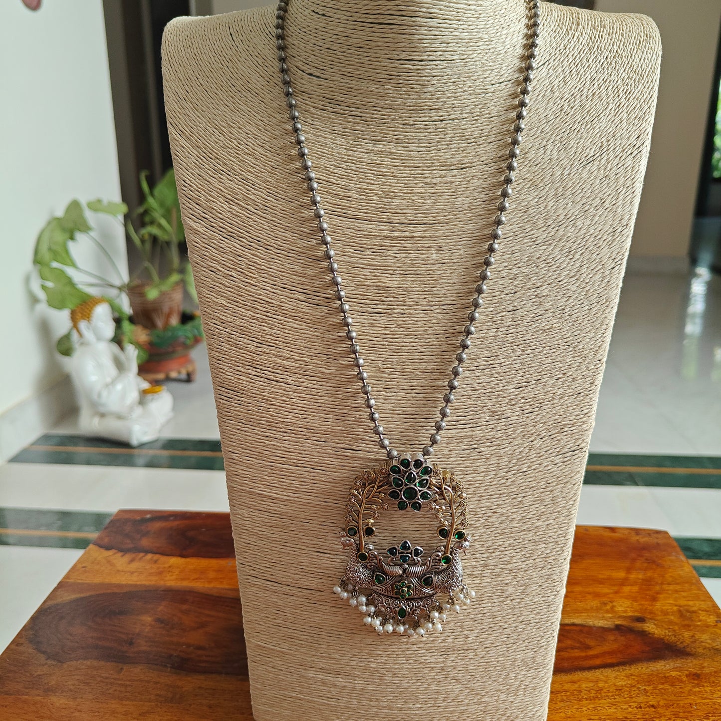 Dual tone two peacock pendant set on bead chain