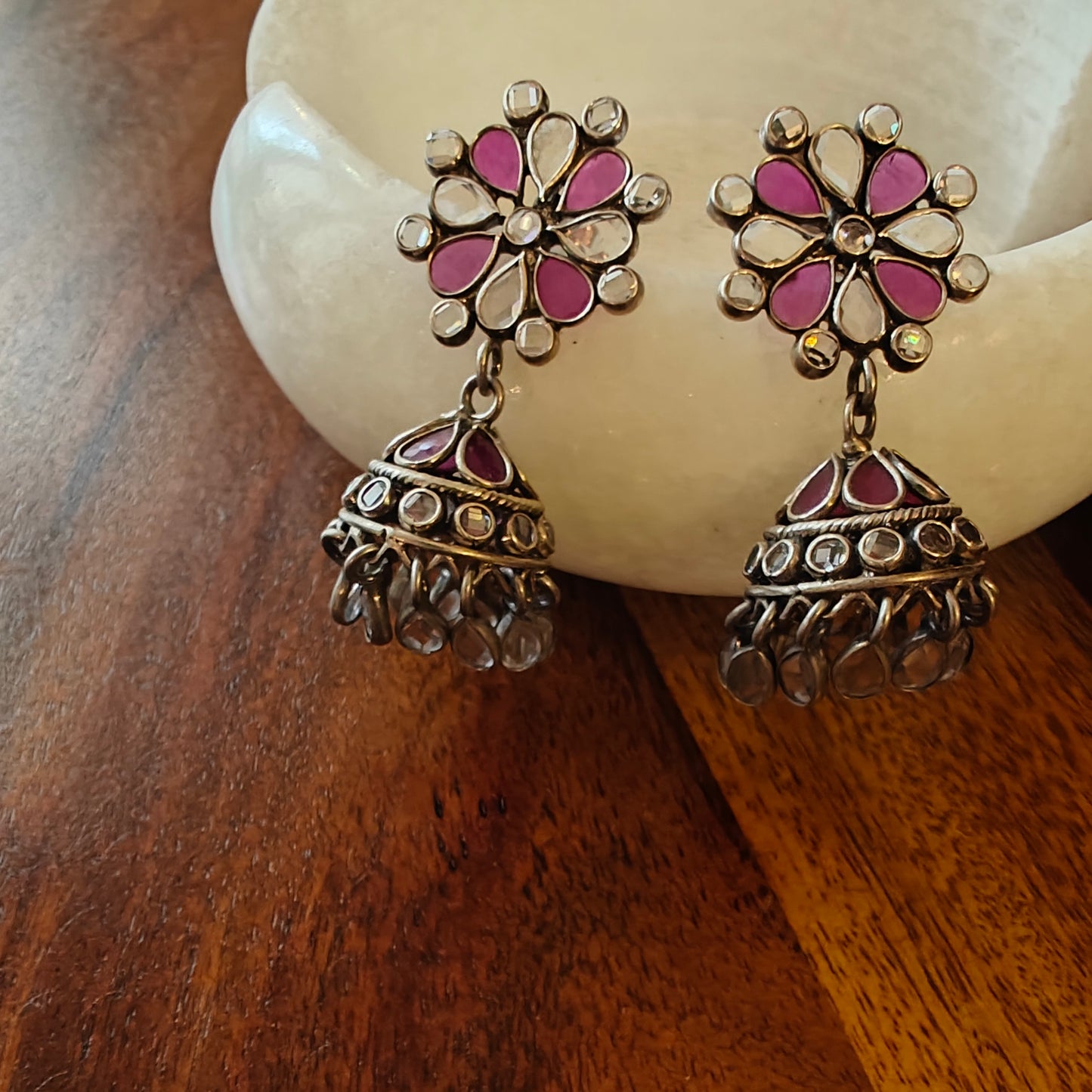 Sterling silver jhumkis with ruby pink and transparent stone