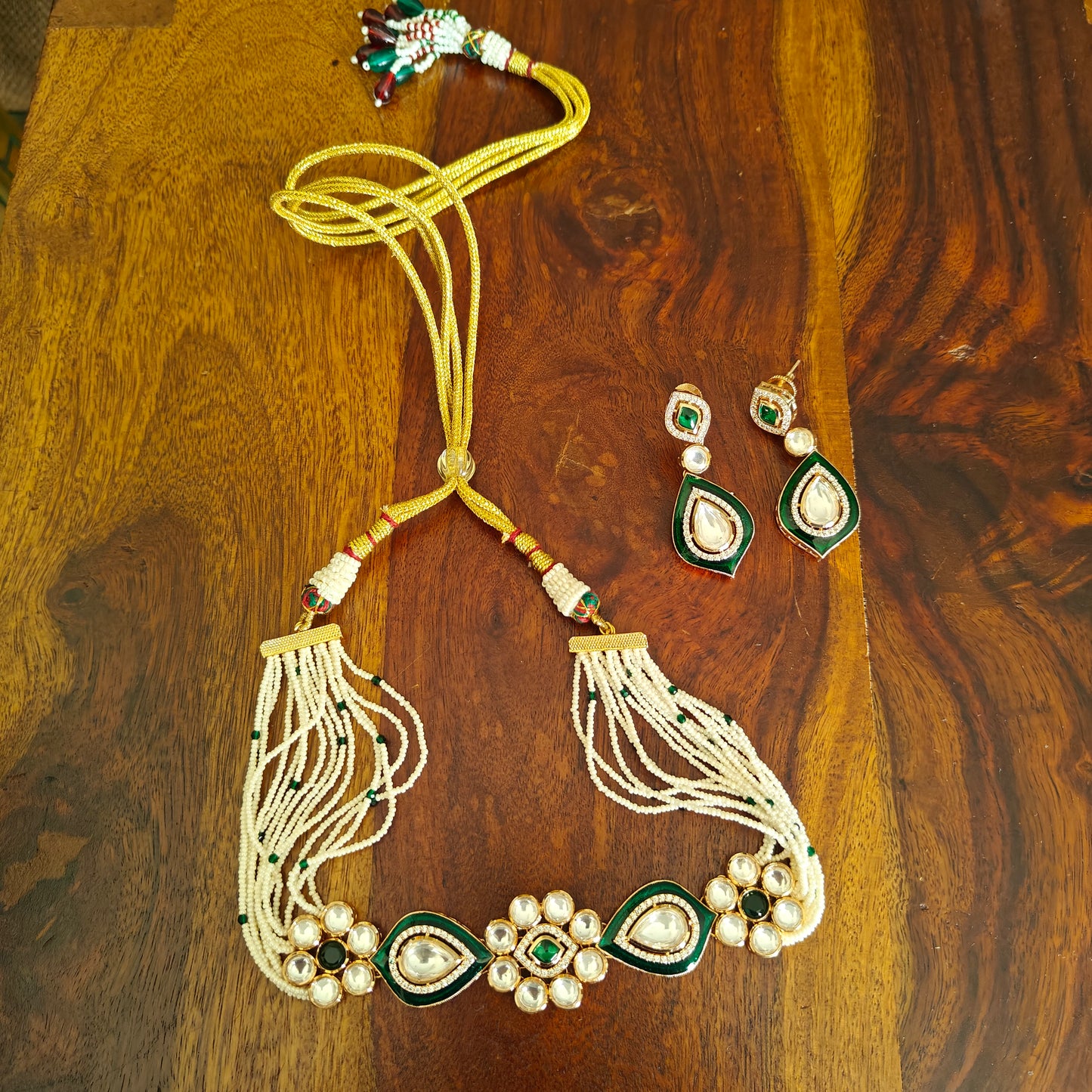 Isai choker set with kundan on poth pearl strings