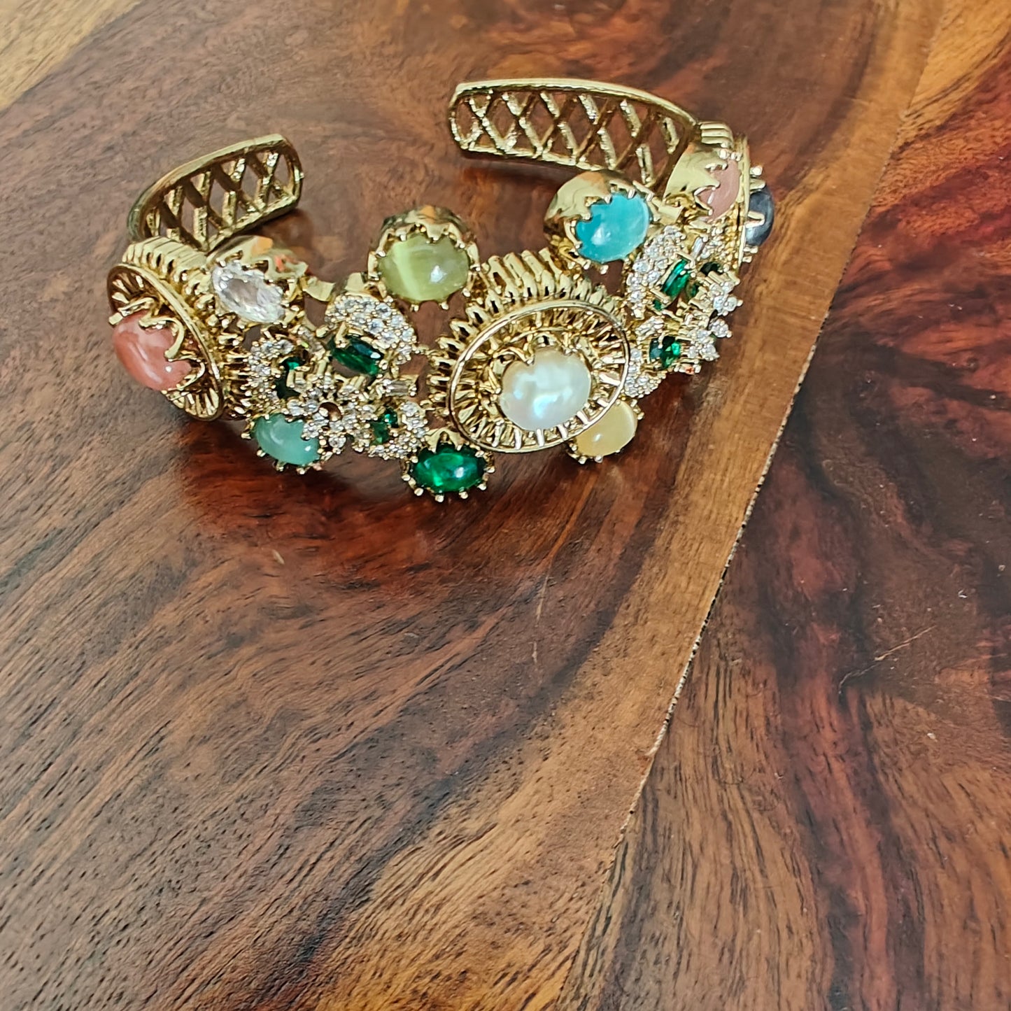 Stone studded kara( bangle) with pearl and different stones