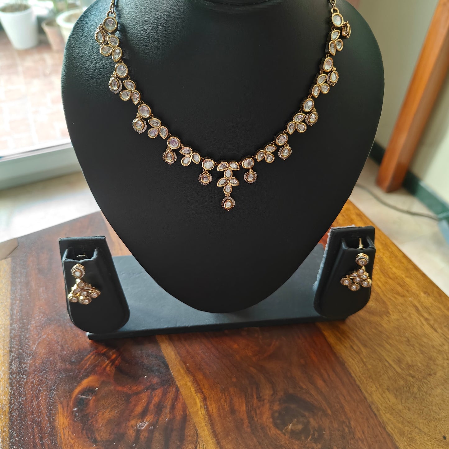 Jyotsna set in antique finish with Kundan
