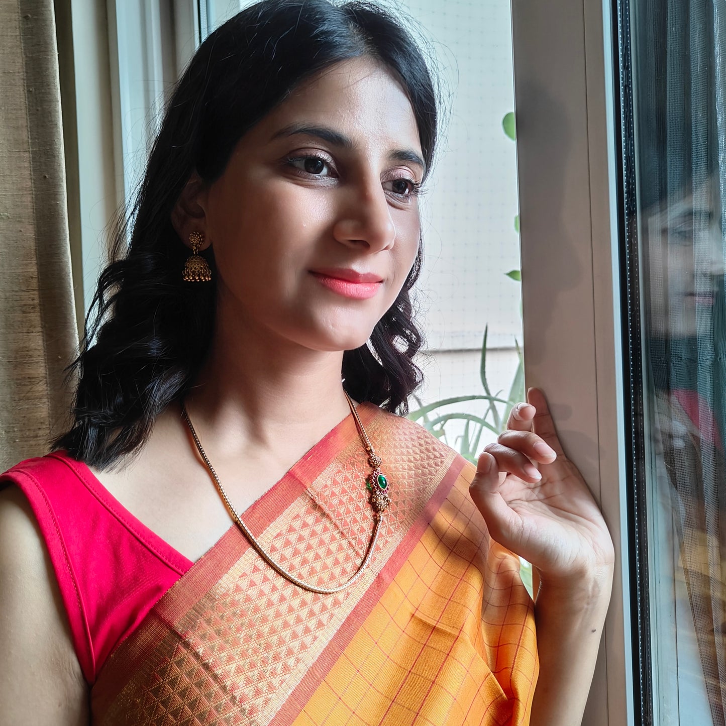 Omana set with side stone piece and jhumkis
