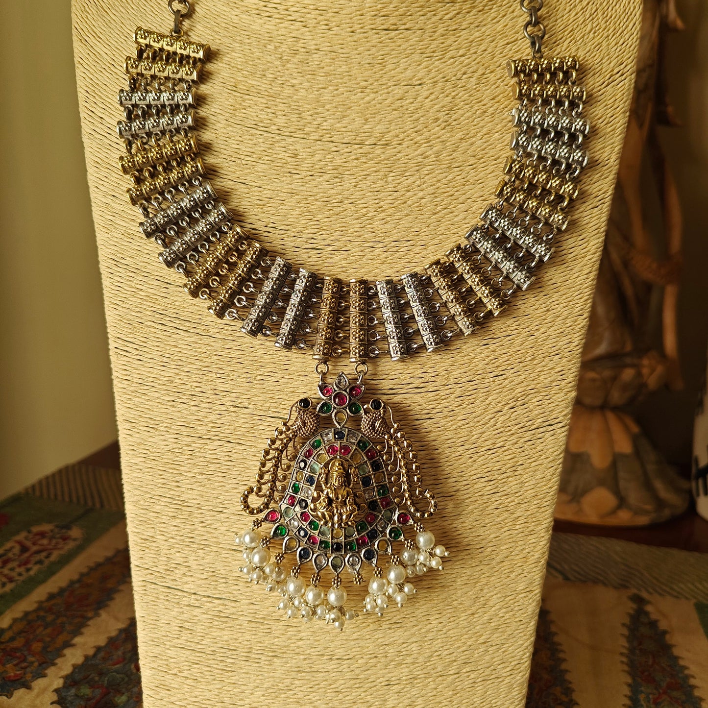 Dual tone necklace set with lakshmi pendant