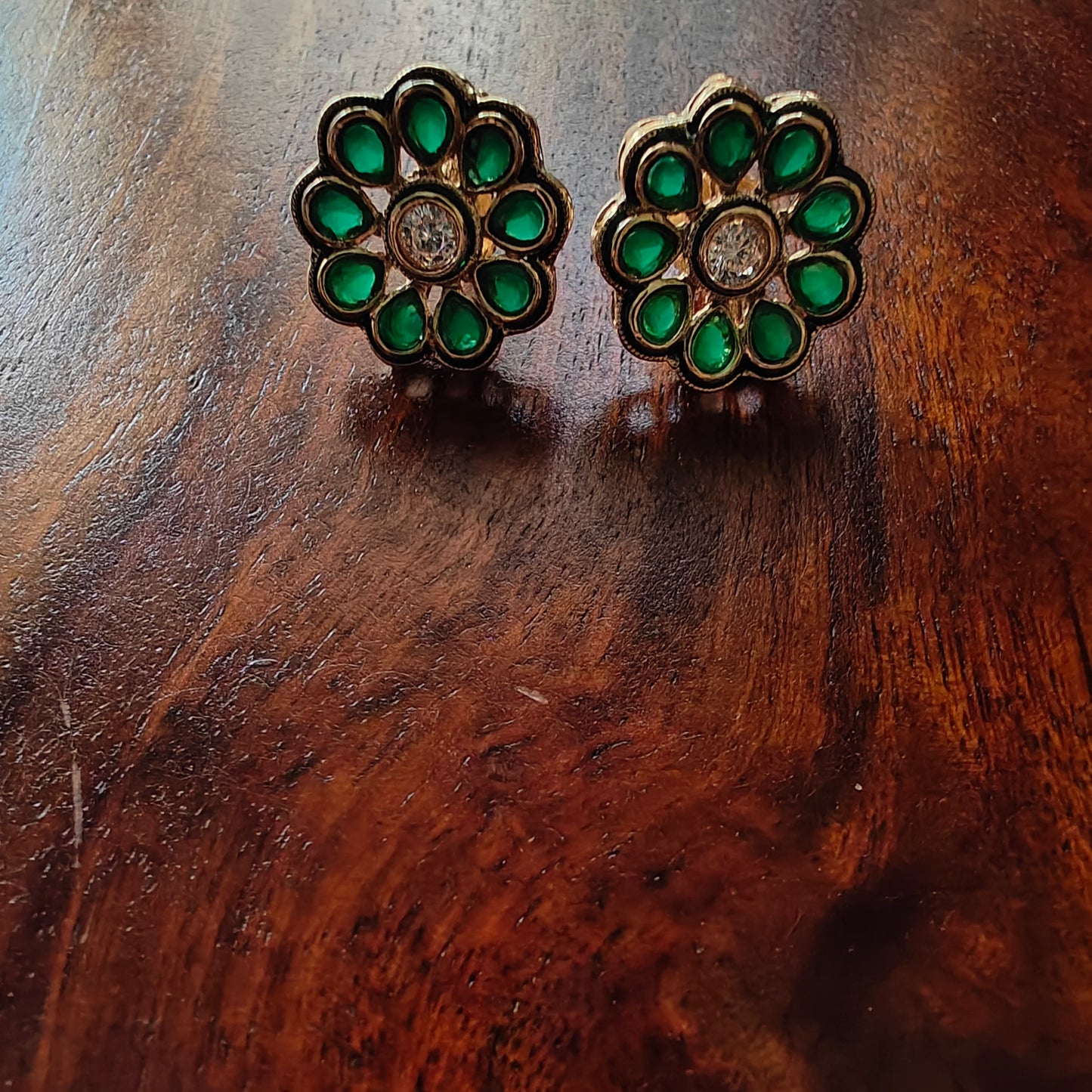 Studs in a flower motif with stones