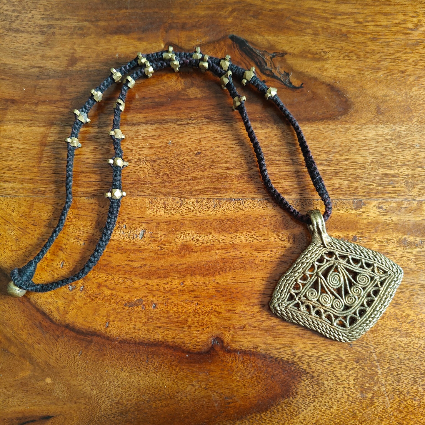 Tribal necklace with brass pendant