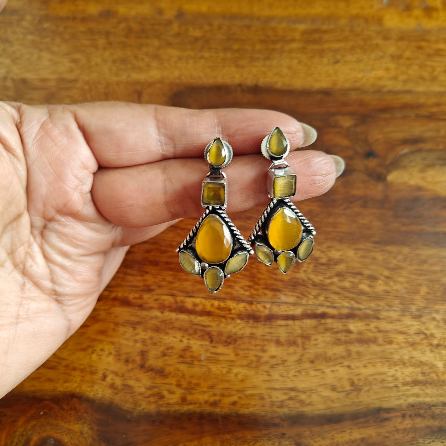 Stone earrings with different shapes of stone