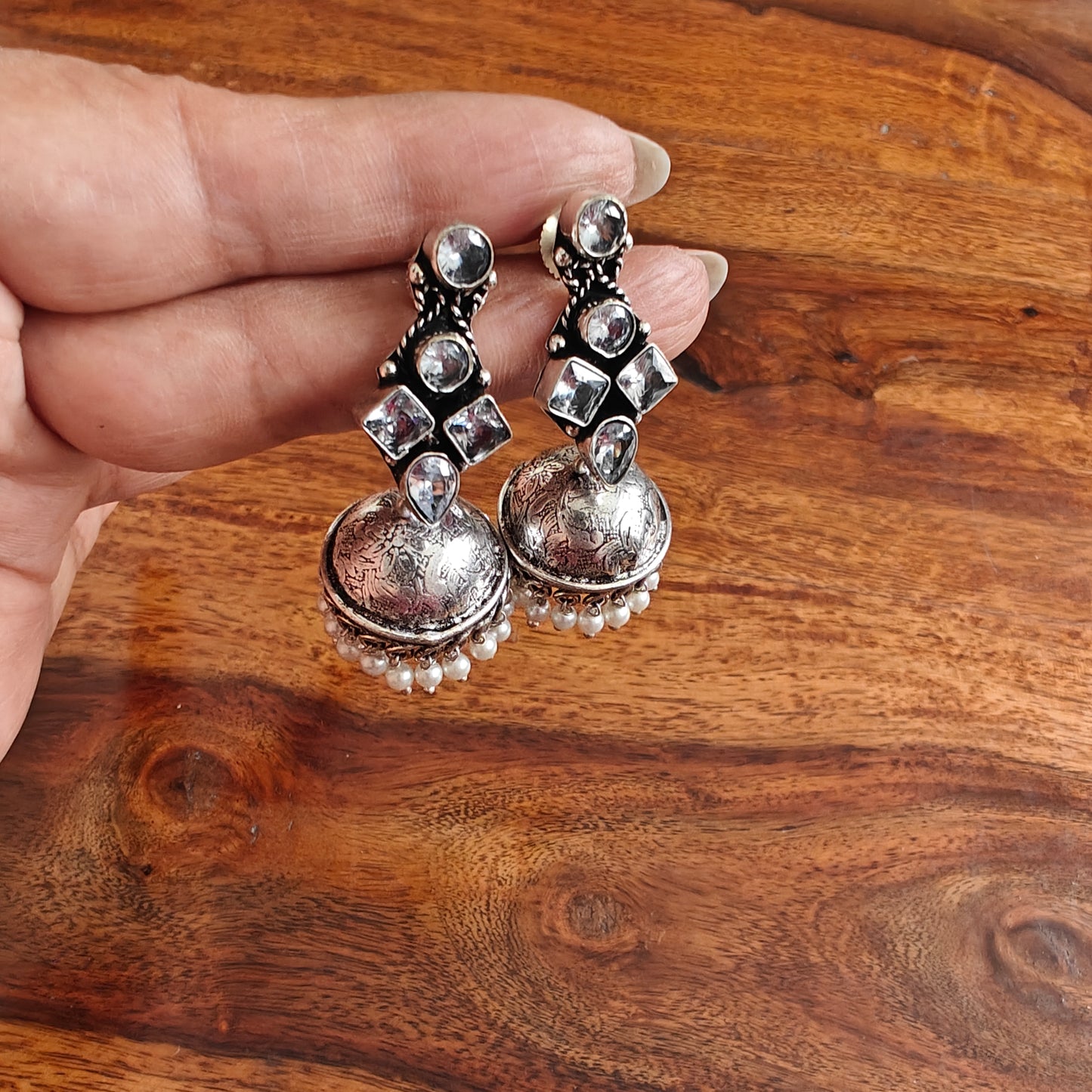 Stone earrings with jhumkis below