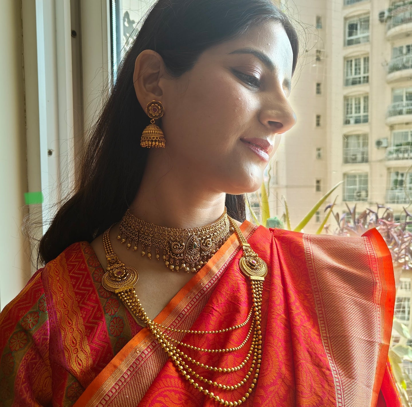 Sameena necklace set with golden bead chains and flower motifs