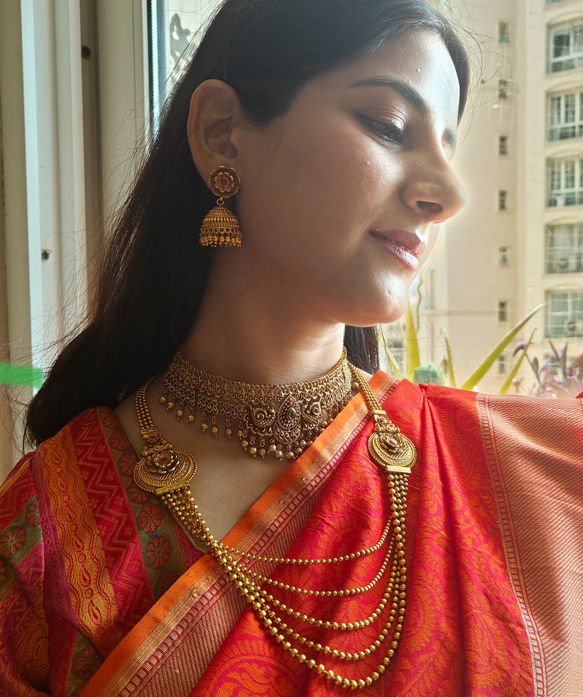 Putul choker with intricate work and peacock motifs