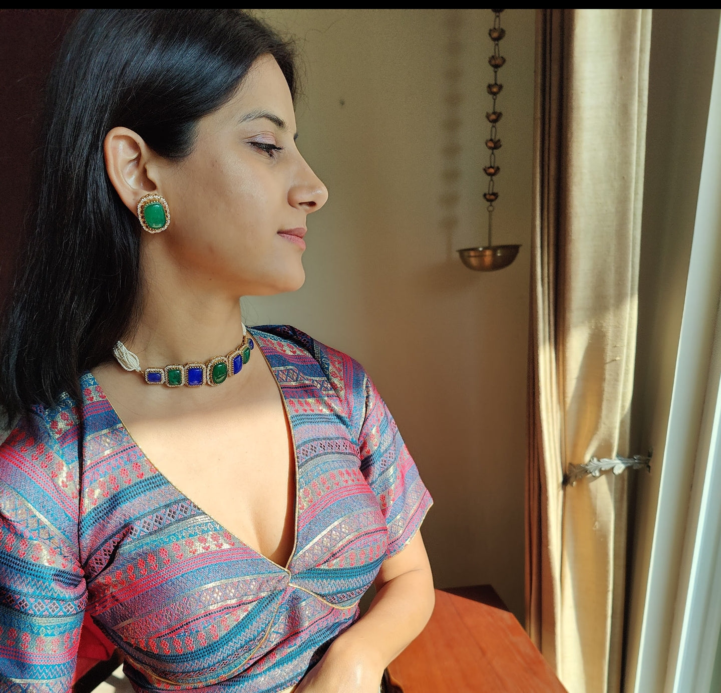 Namya choker with coloured stones on poth pearl strings