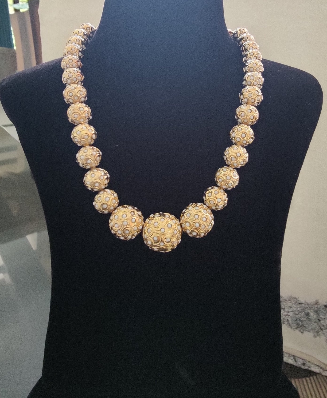 Deepamala set with golden beads with embedded pearls