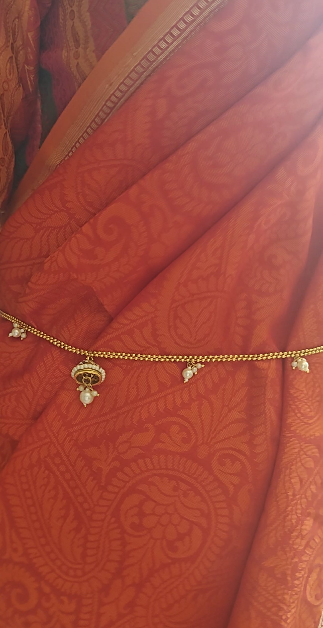 Golden belt with pearls and half borla