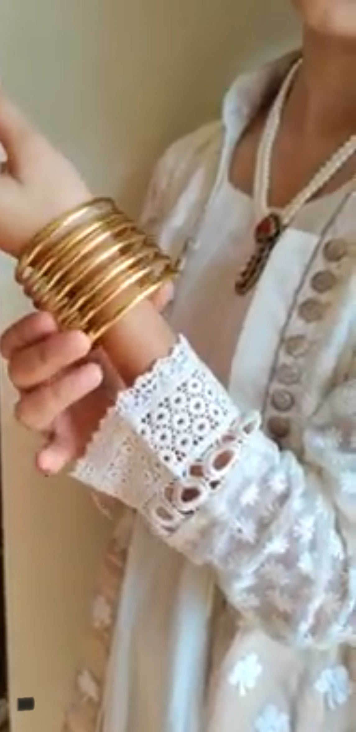 Hiranya golden twisted bangle stack