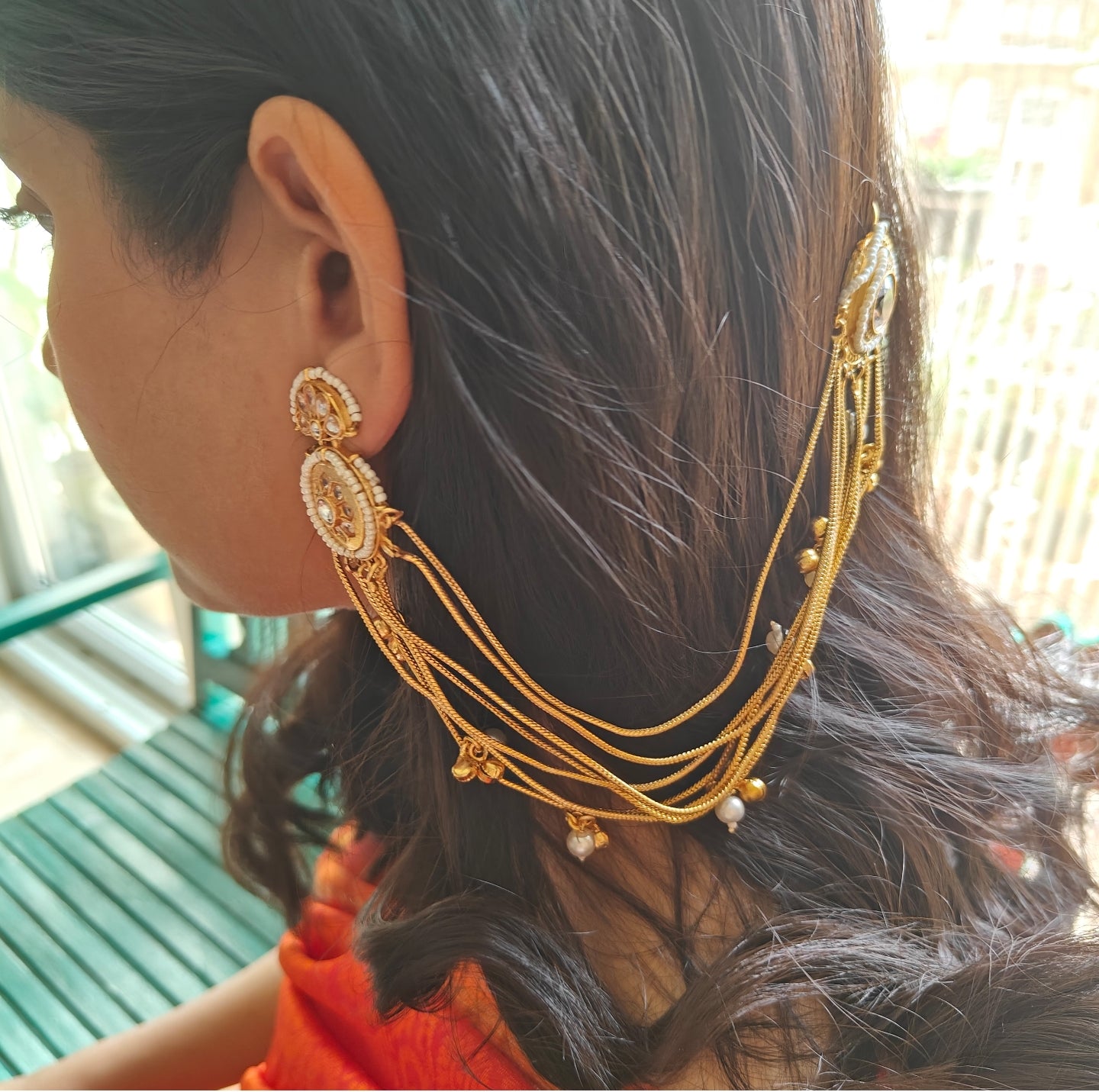 Earrings with earchains and studs on both sides