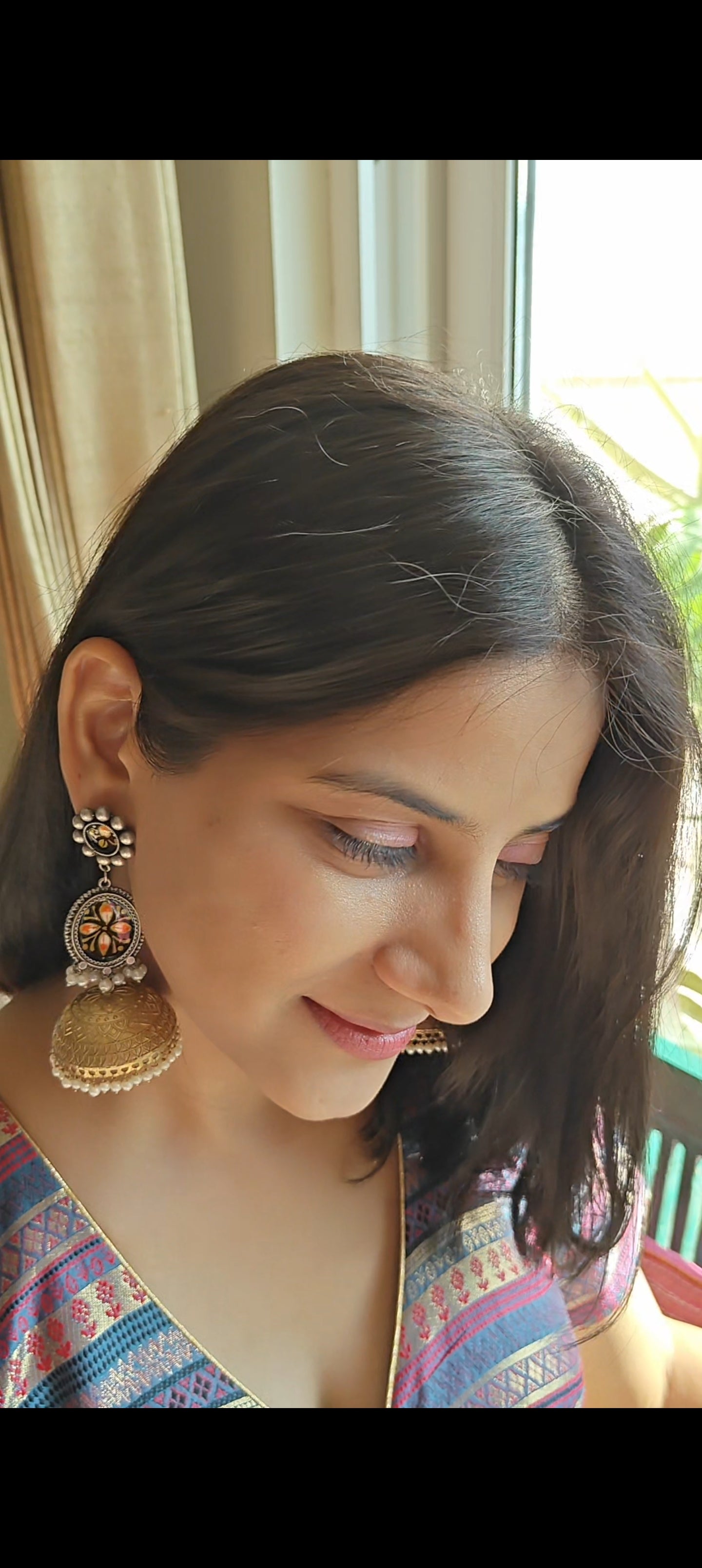 Jiya double tone jhumkas with painted flowers