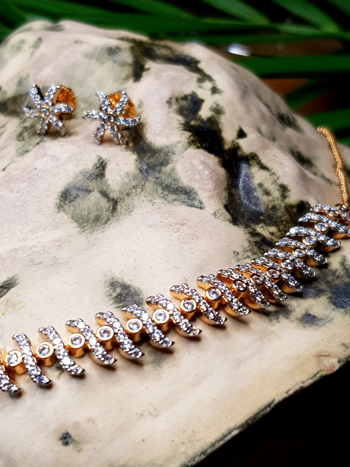 Sleek gold finish set with CZ and starfish shaped studs