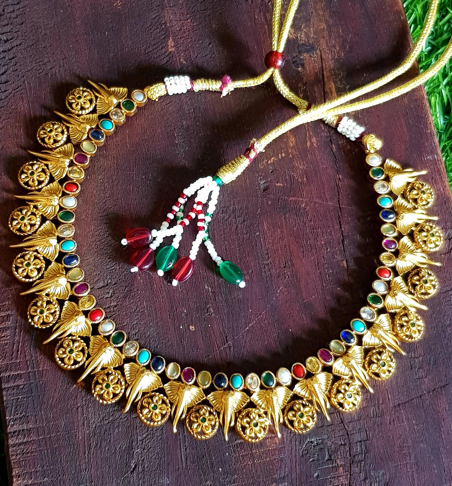 Temple jewelry set, necklace with elephant head design and navratan stones inlay, matching jhumkas (earrings)