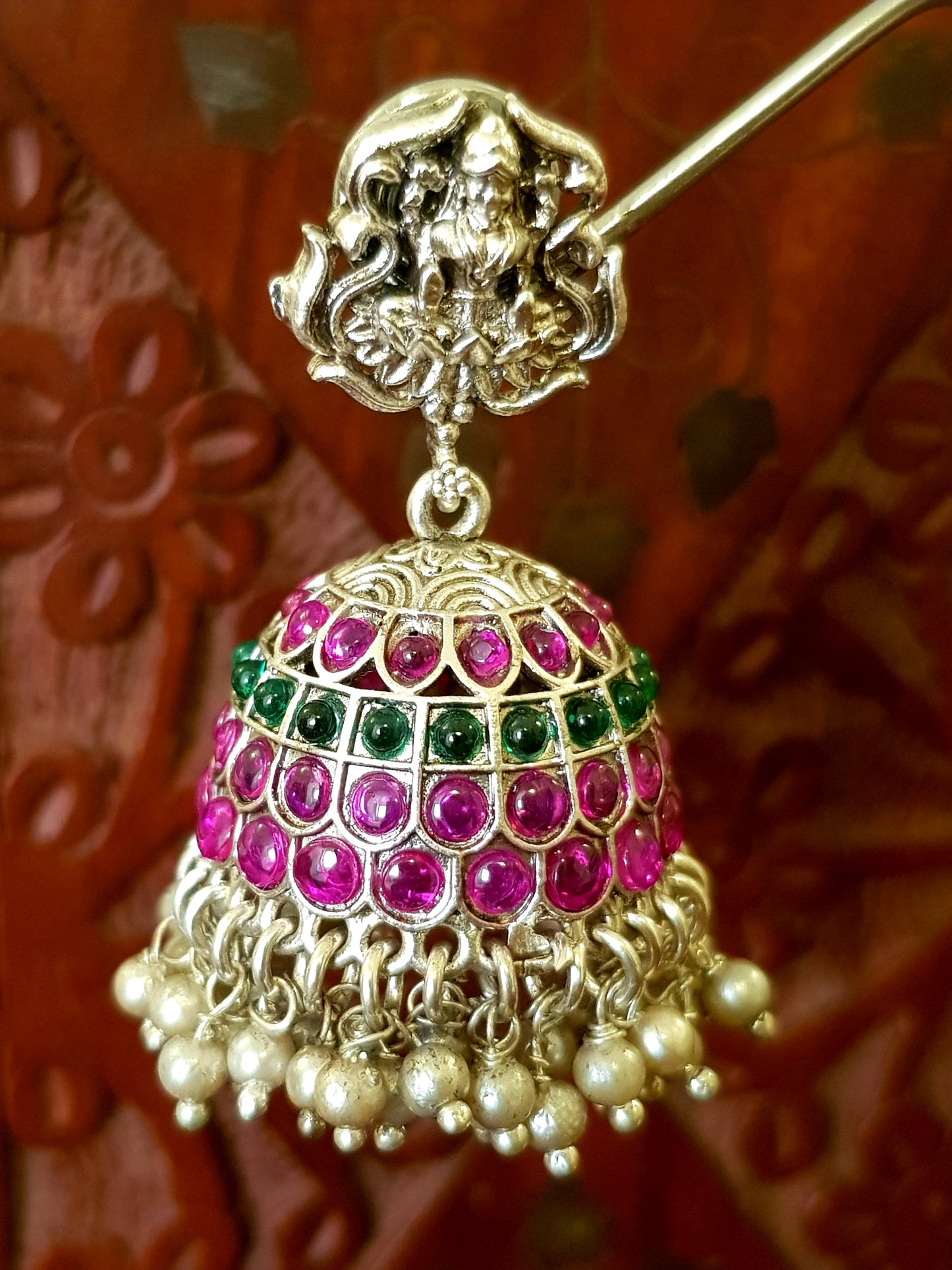 Silver finish temple jewelry set, necklace with Lakshmi motif, green-red stones inlay, matching jhumkas (earrings)