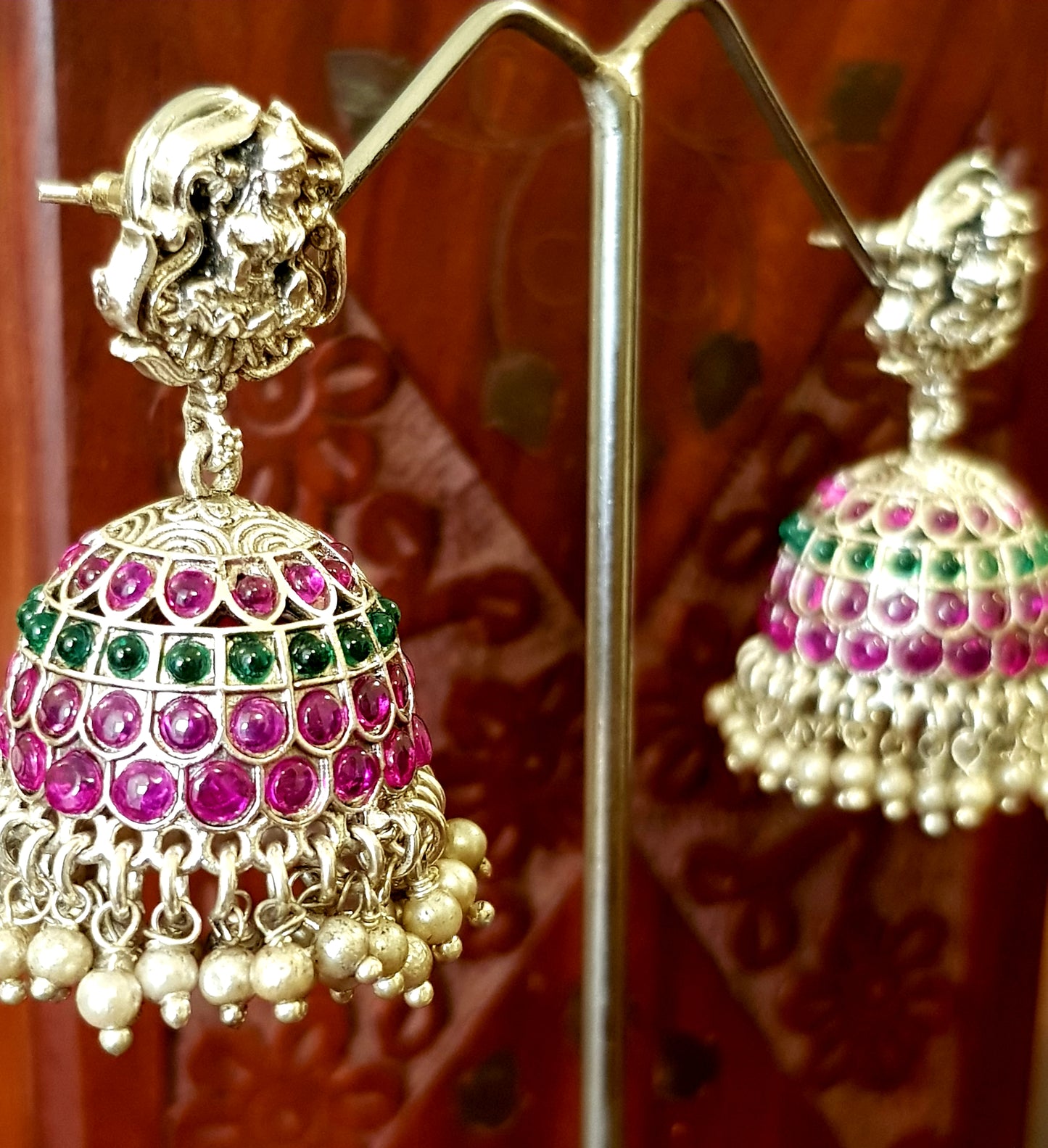 Silver finish temple jewelry set, necklace with Lakshmi motif, green-red stones inlay, matching jhumkas (earrings)