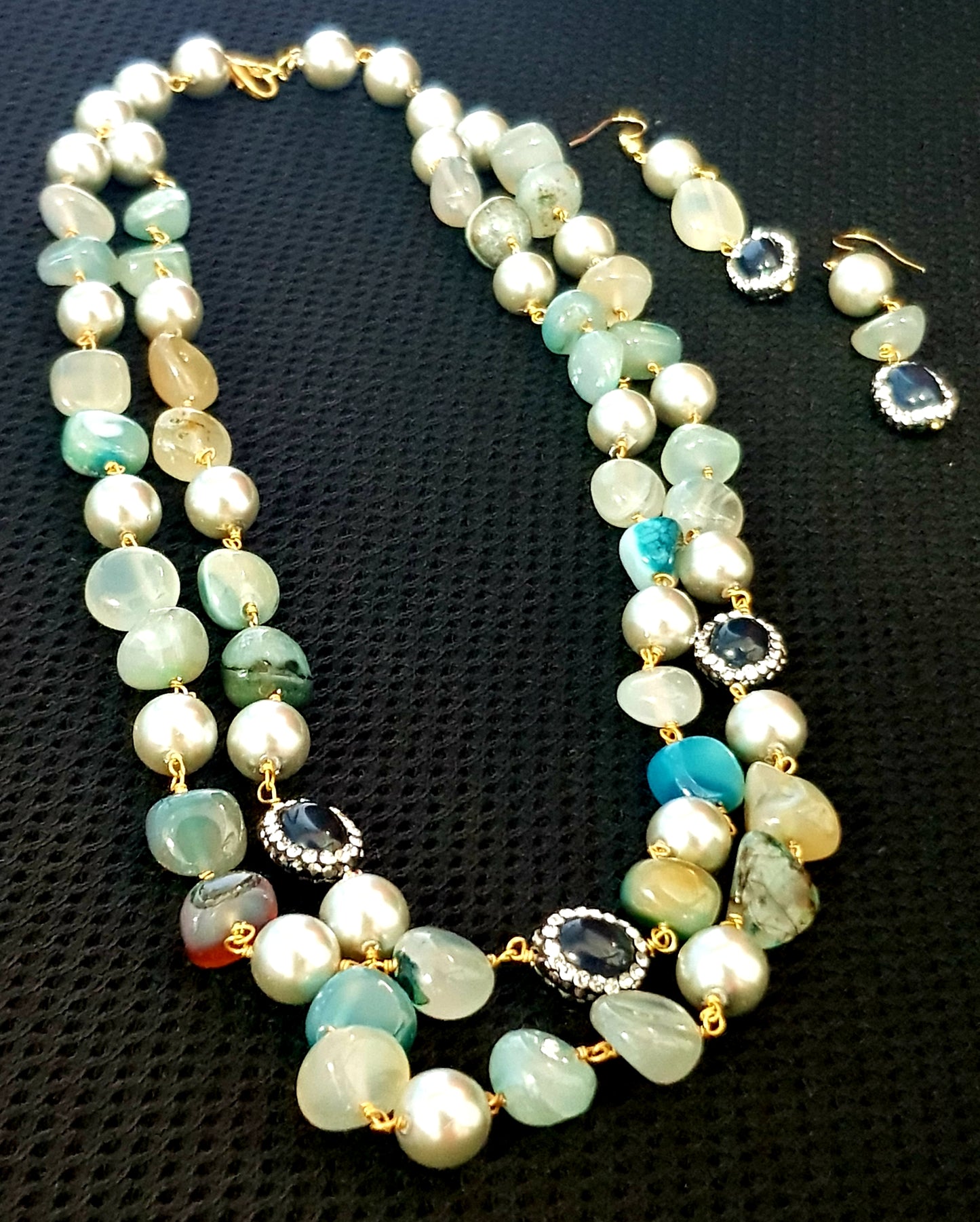Set with a double string necklace with pearls,stone with CZ,multicolour stones