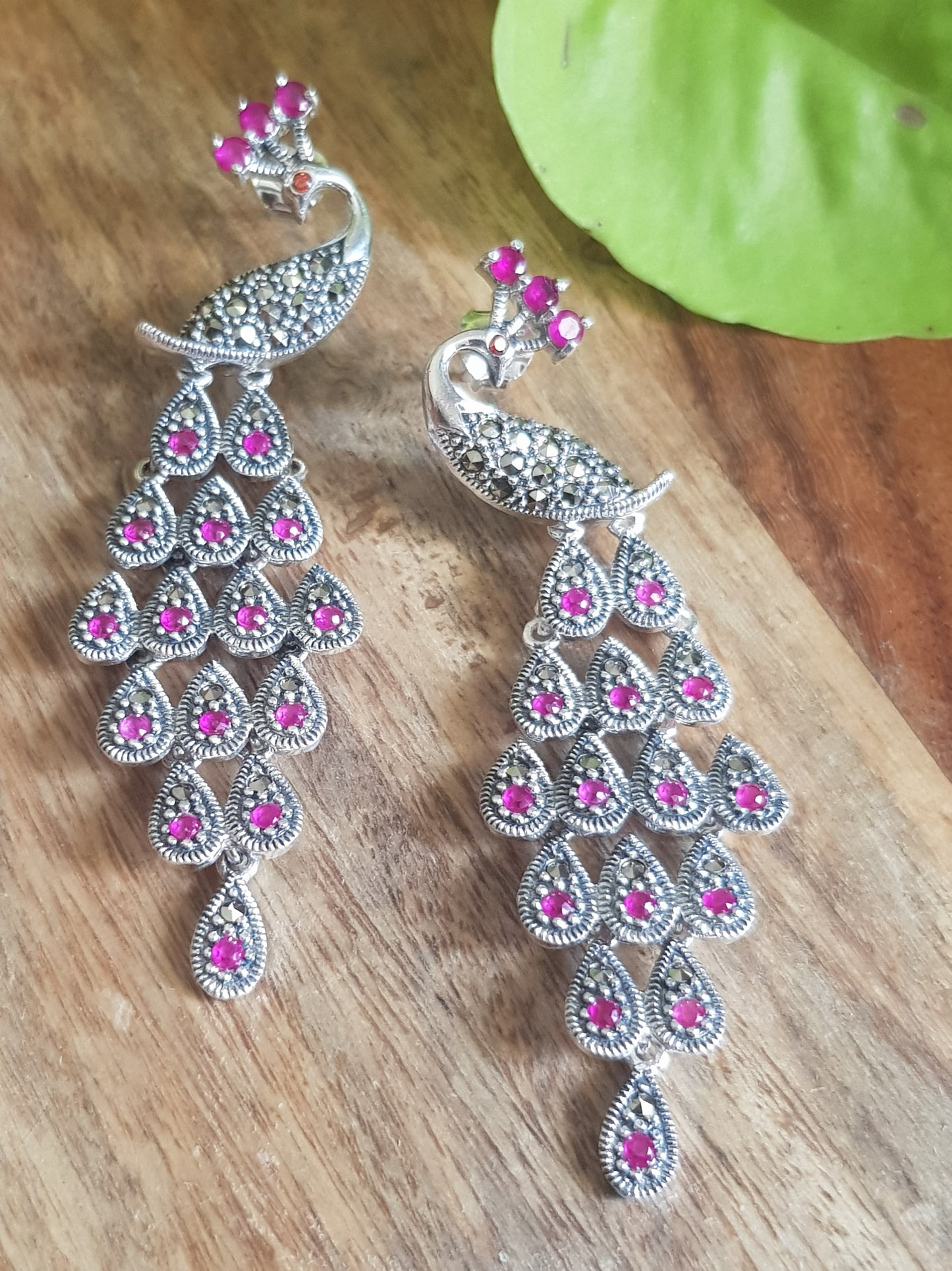 Silver peacock dangler earrings (earrings) with stones