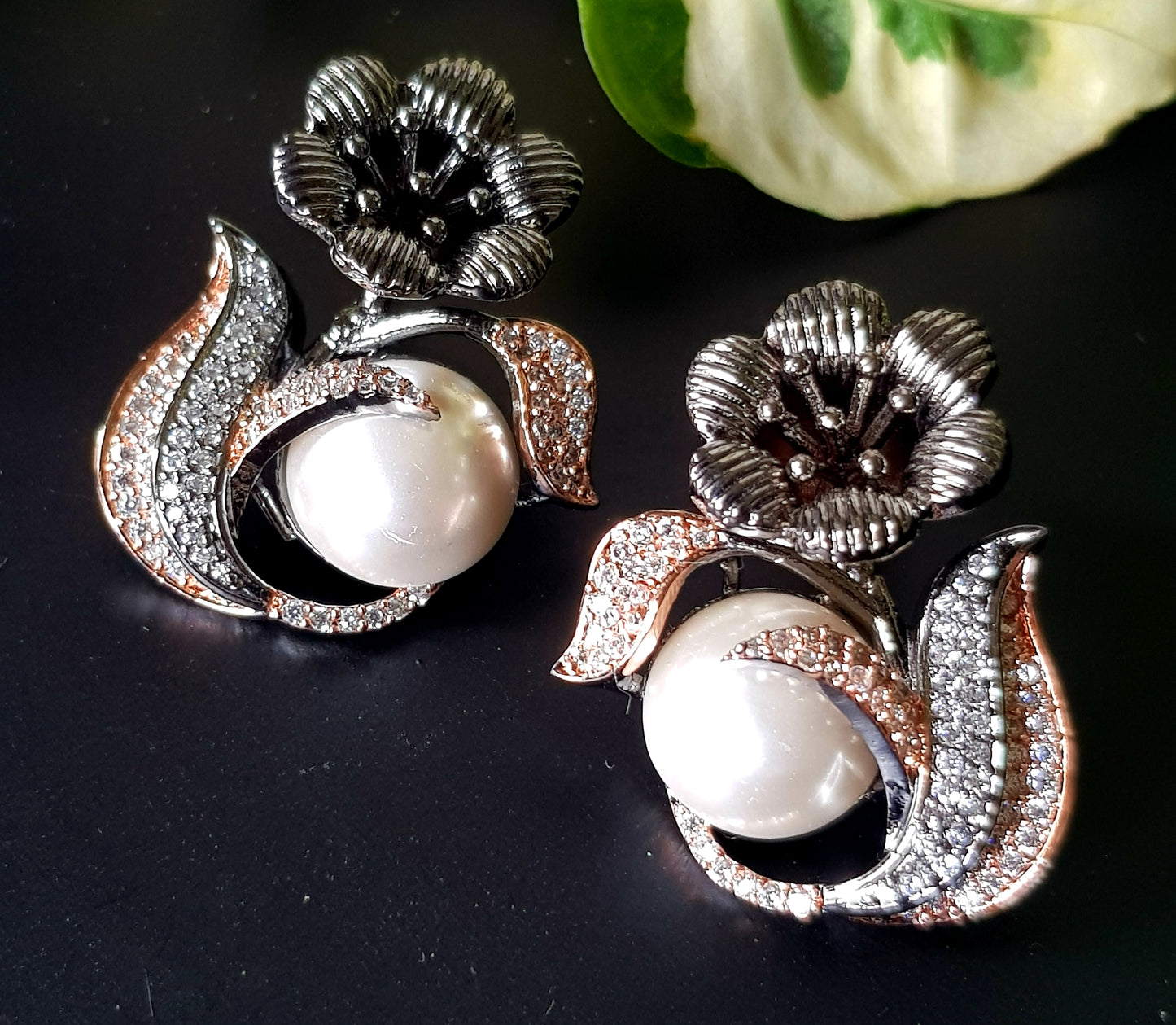Antique platinum/rose gold finish studs (earrings), flower motif with a big pearl and CZ detailing