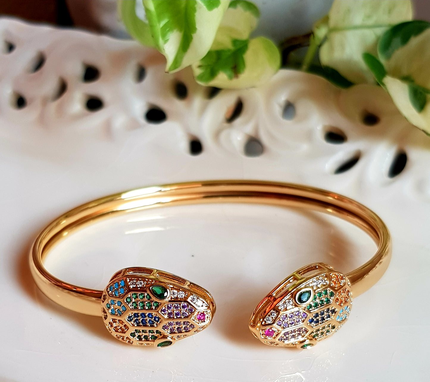 Smart snake head gold finish bracelet, multicolored stone detailing