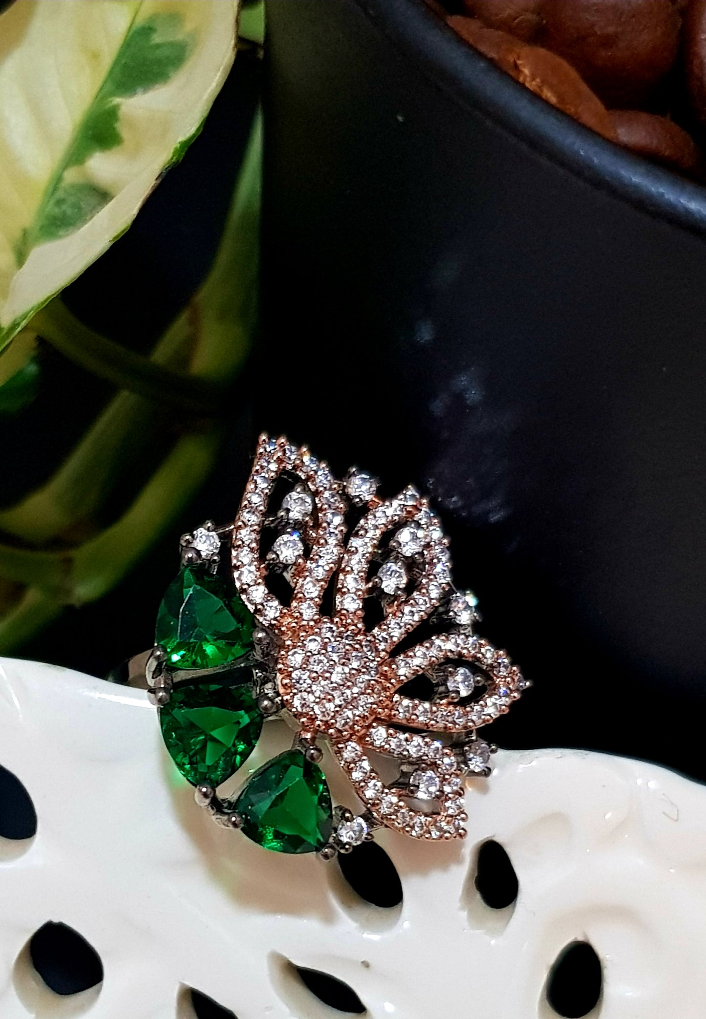 Antique rose gold finish ring with 3 triangular sapphire/emerald/ruby with CZ embellished flower pattern