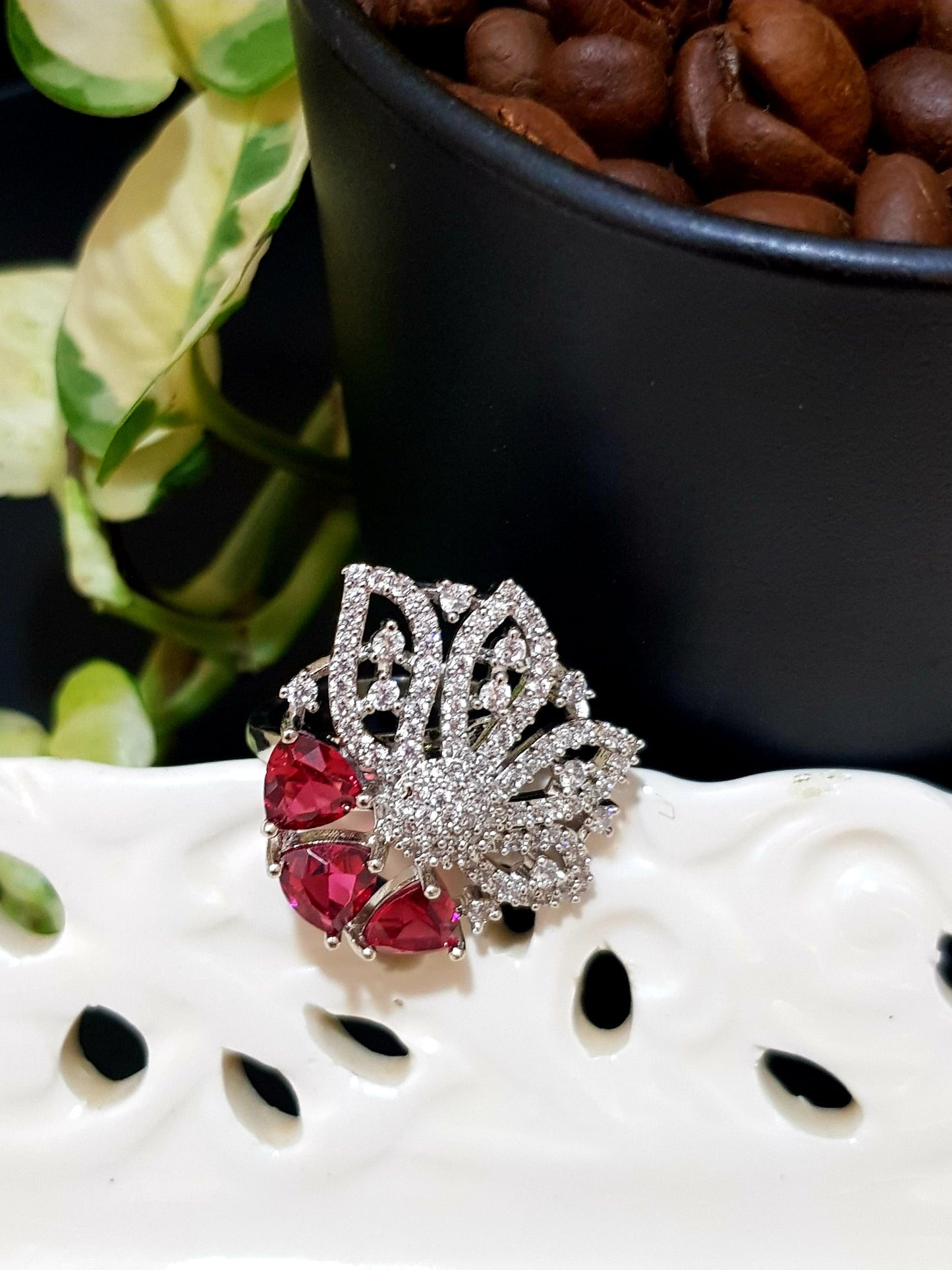 Antique rose gold finish ring with 3 triangular sapphire/emerald/ruby with CZ embellished flower pattern